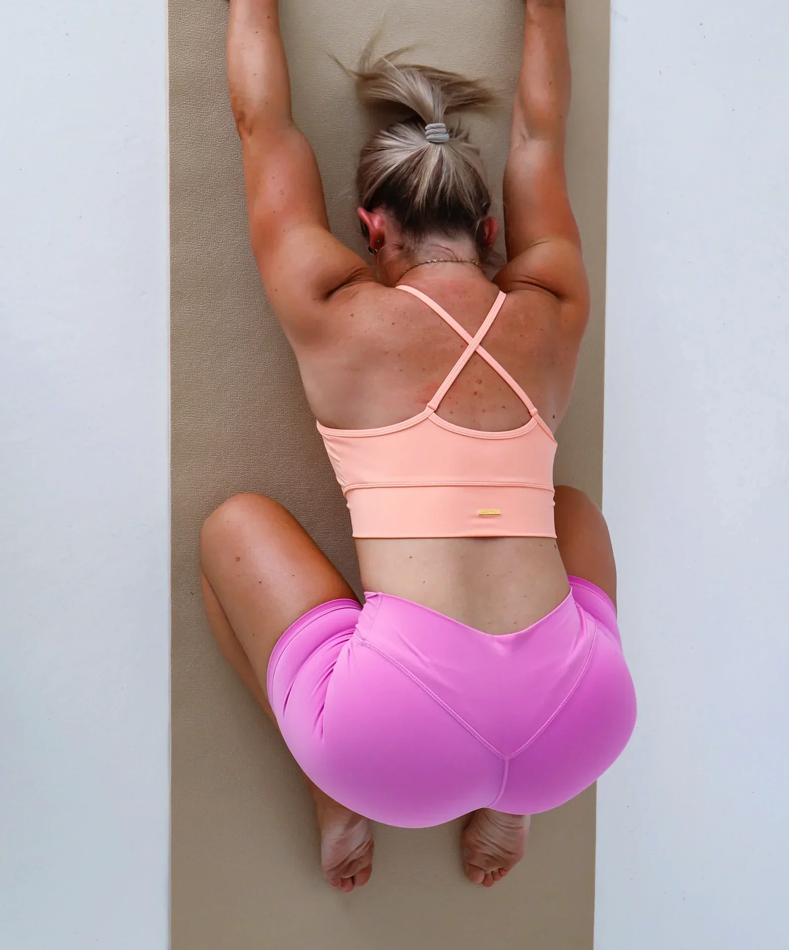 Fearless Movement Oak Flats founder Melinda Sullivan in childs pose position for breathwork and reset session