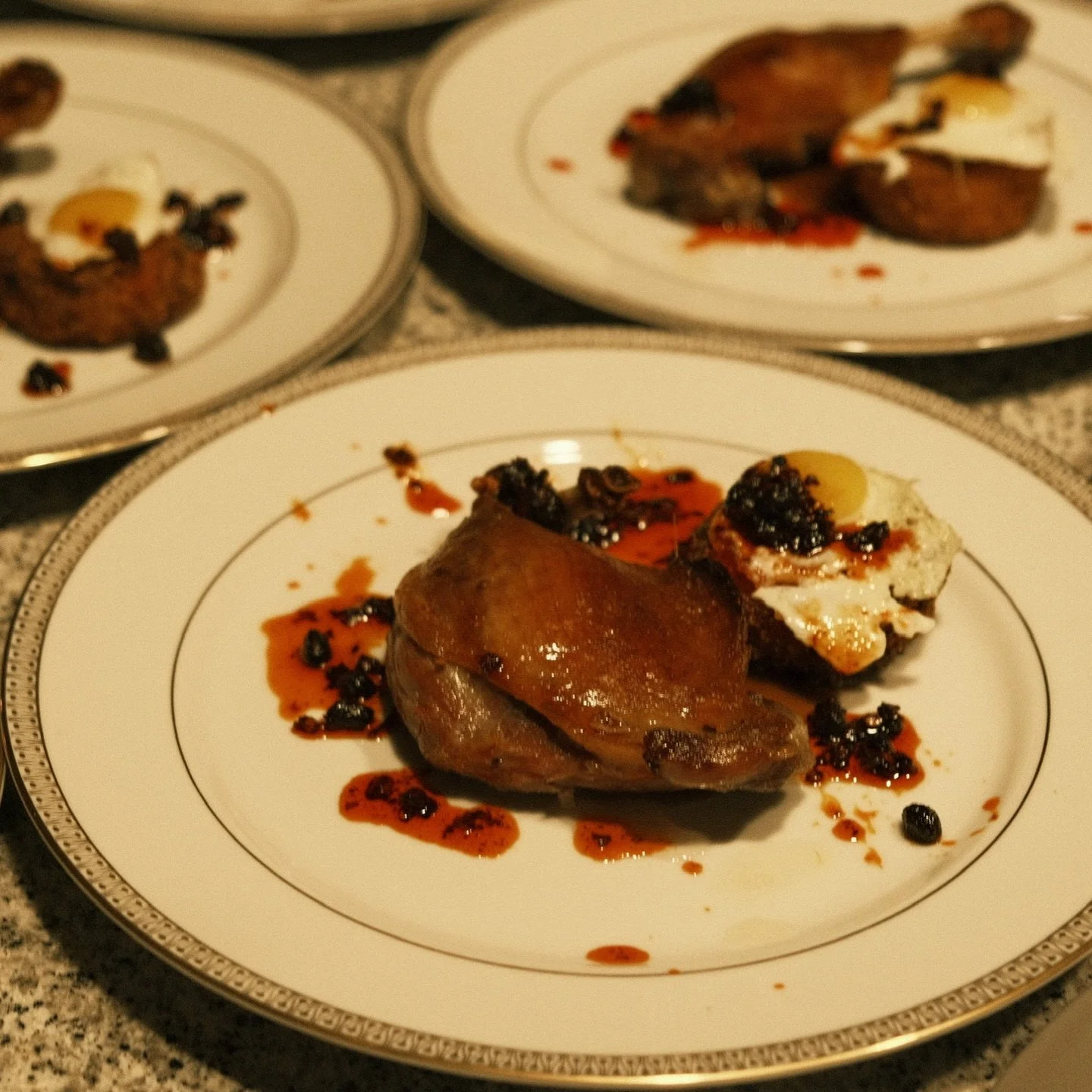 10.16 HAGO Classics Highlights - Duck Confit 
 
🦆 Third Course 🦆
For our main course, we brought back a dish we heavily recipe tested and served earlier this year at a private dinner 🍽️

At the base, we have a velvety duck jus made from hellaaaaa 