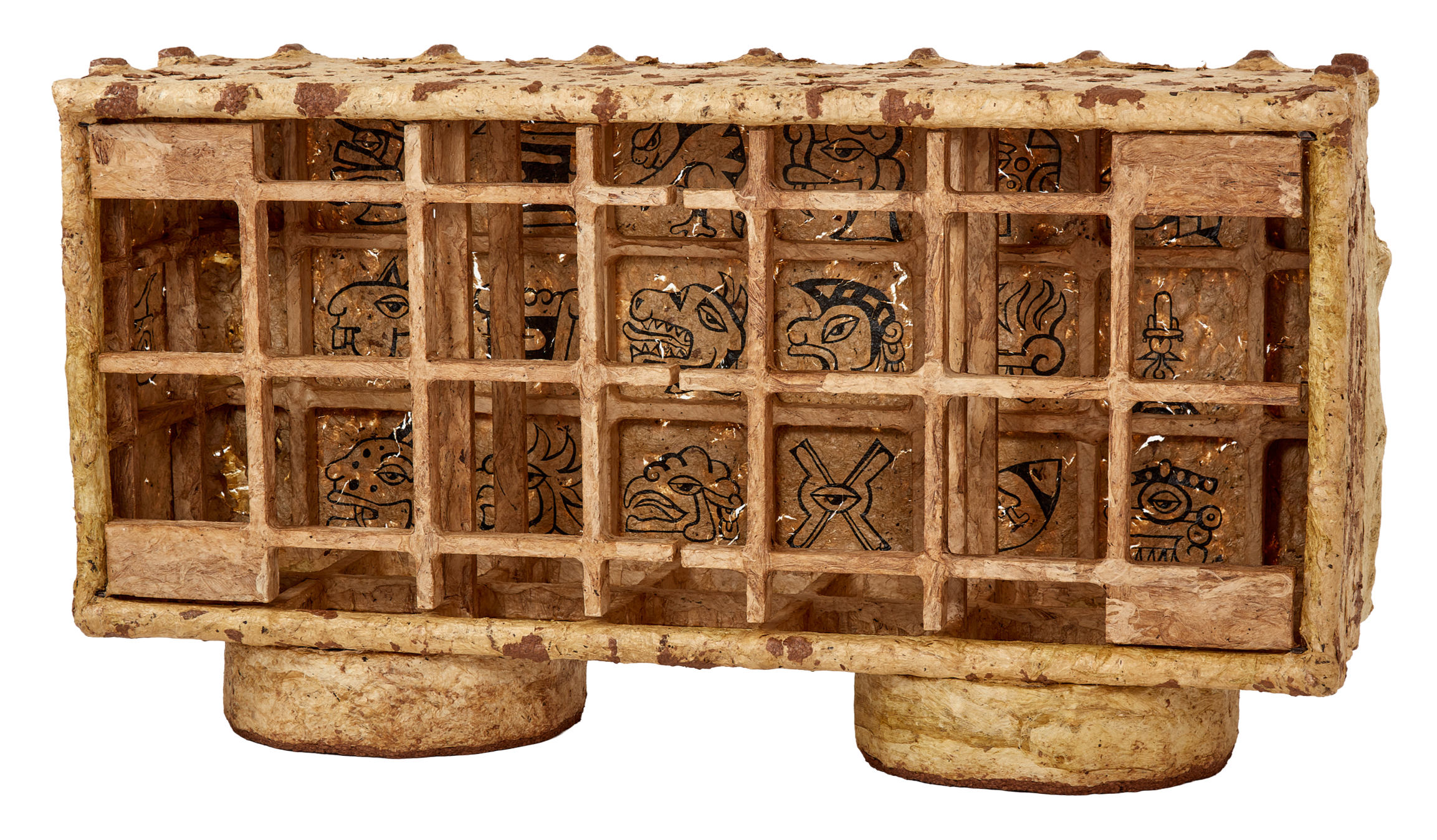 An ancient Egyptian scarab beetle amulet with intricate hieroglyphic carvings and painted details, housed in a grid-like wooden casing.