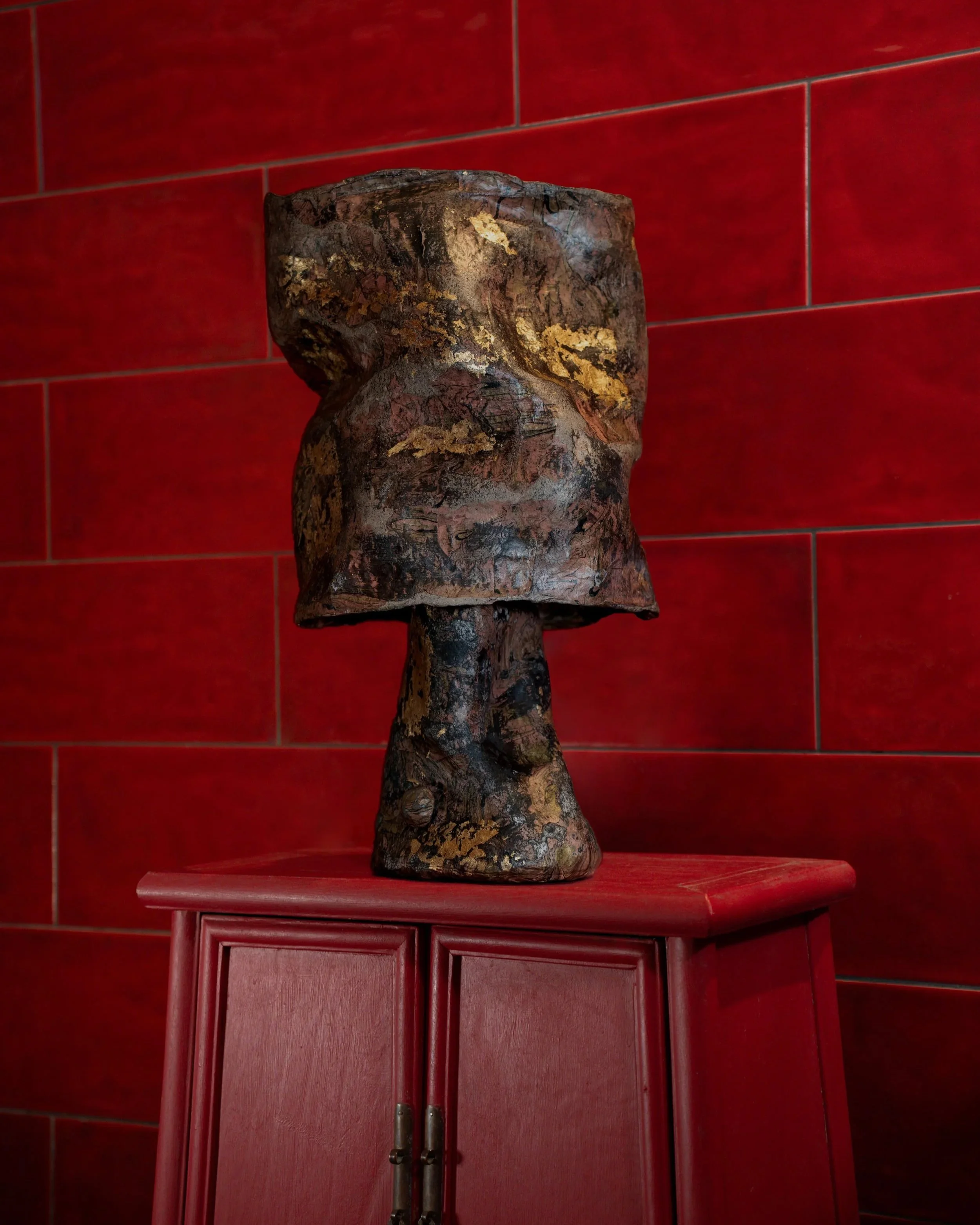 Samuel+Aguirre_Fiber+Table+Lamp+Guilded+Pink+on+red_Photo+Cred+Travis+Lemire.jpg