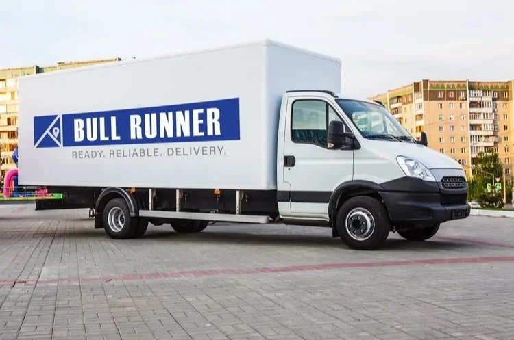 Bull Runner Courier box truck providing commercial delivery service in Colorado.