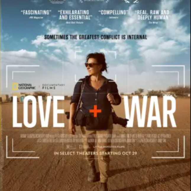 Poster for the documentary film "Love and War" featuring a woman walking in a desert landscape with a backpack, under a blue sky with clouds, with quotes from reviews and start date of October 29.