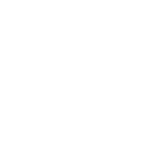 Outline of a factory or industrial building with smoke stacks.