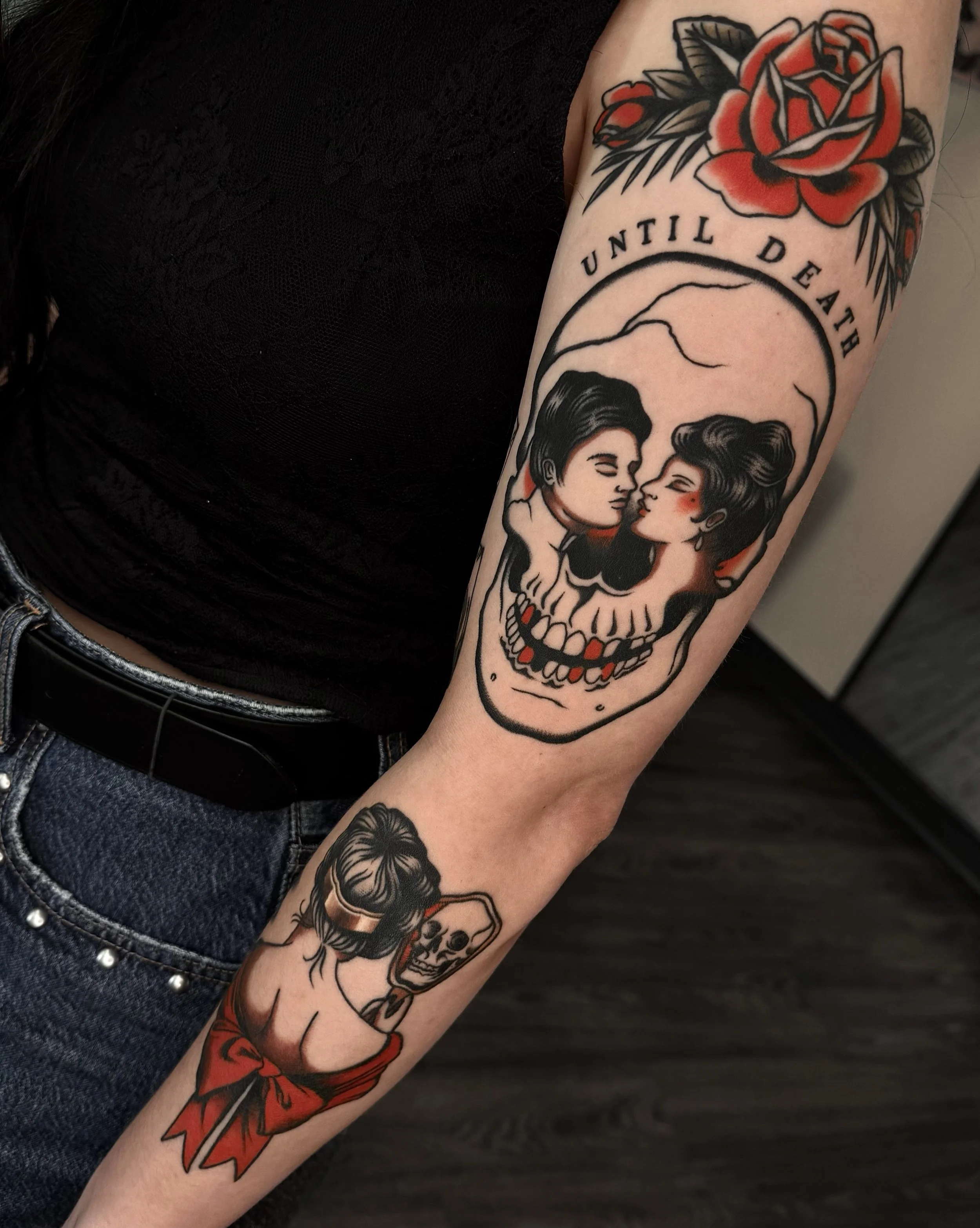 Tattoo of two women facing each other inside a skull with the phrase "Until Death" above.