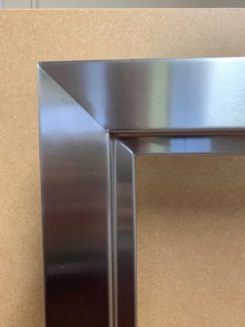 Stainless-steel-frame-mitred-corners.jpg
