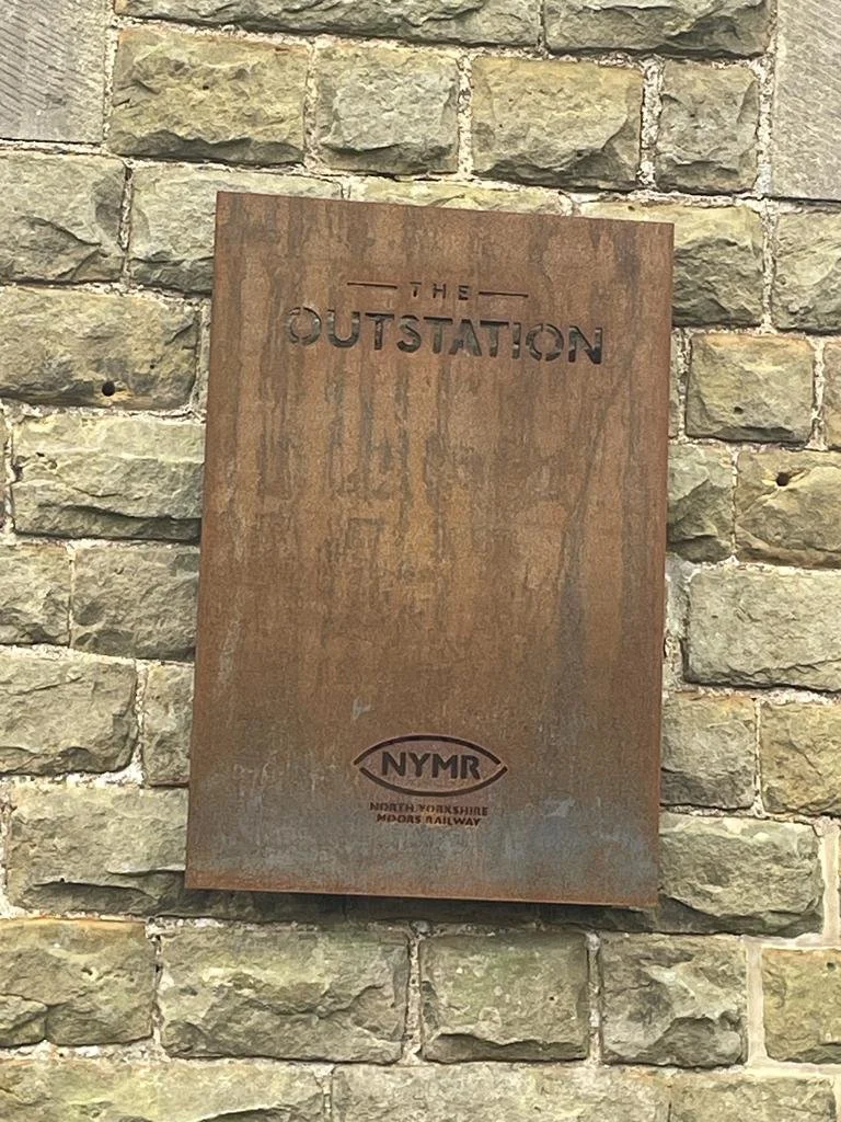 the-outstation-sign-corten-steel.jpg