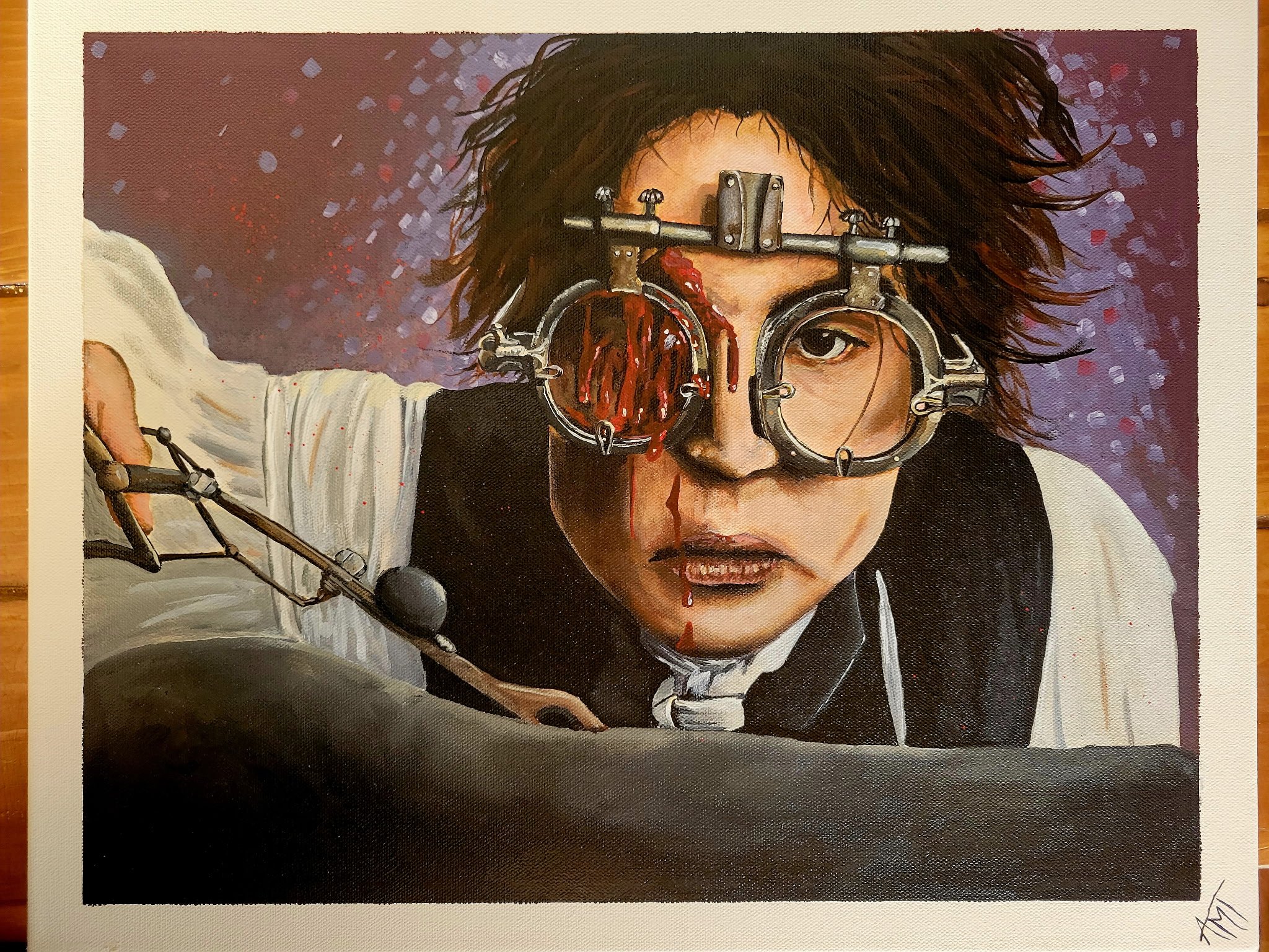 A person with messy dark hair wearing eye gear with blood dripping from the eyes, in a dark futuristic setting.