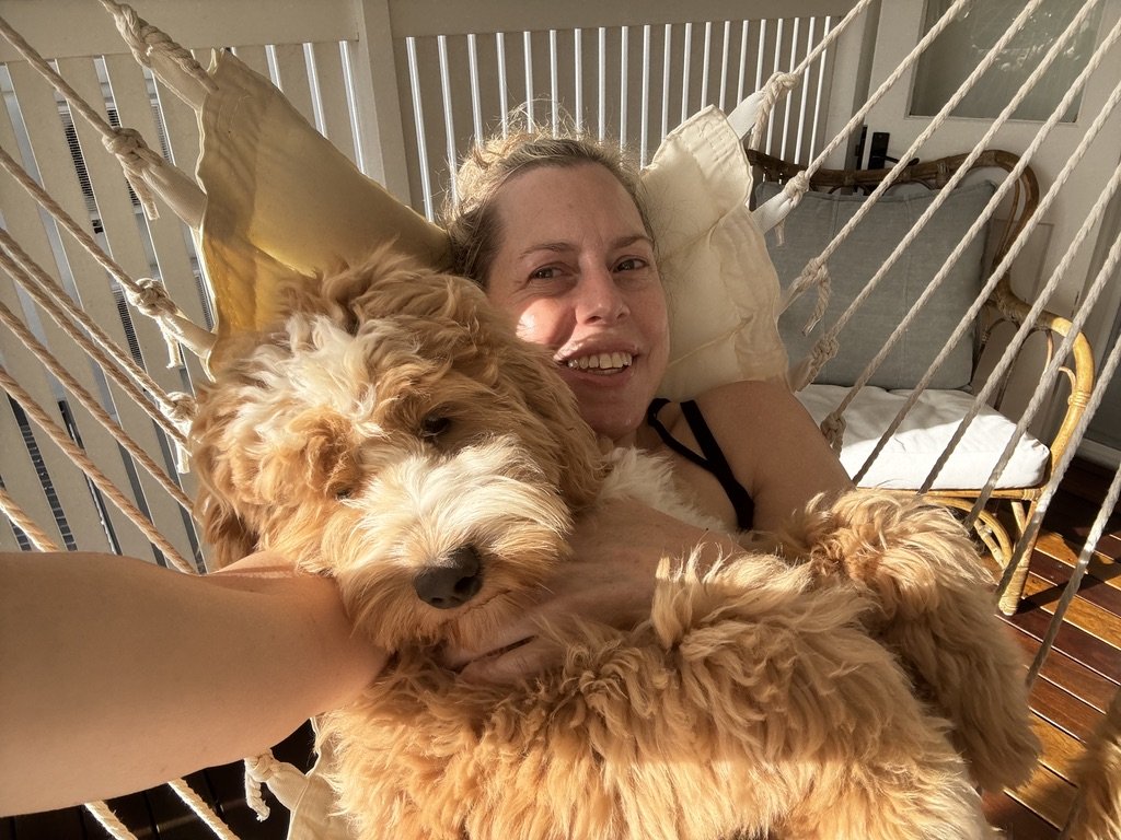 Neisha Cass with Murphy, her Australian Cobberdog