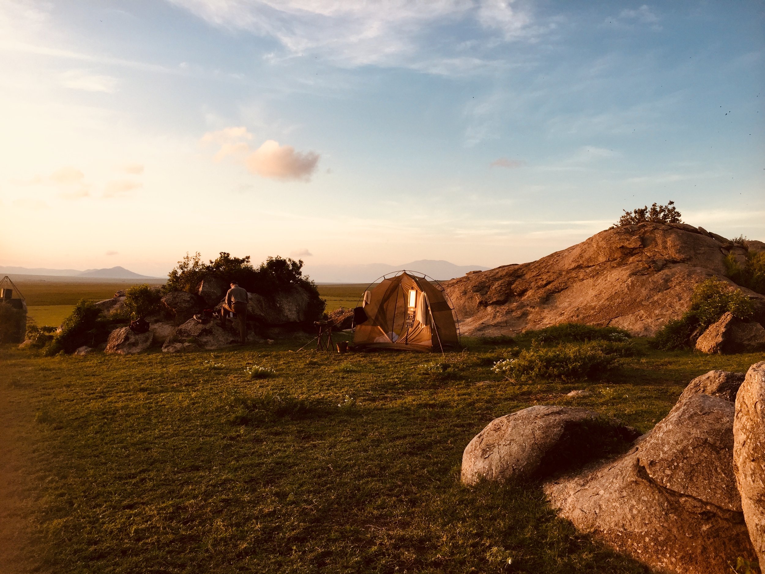 Fly camp set up among kopje rocks in the Serengeti