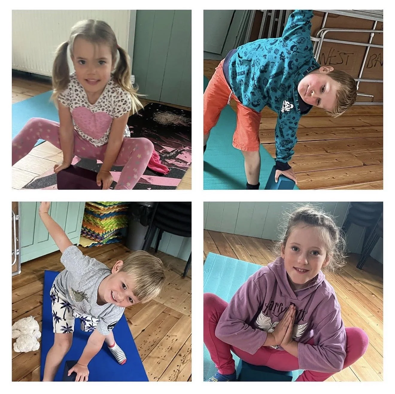 Four children performing yoga exercises on mats indoors, each in a different pose, with a wooden floor and light-colored walls.