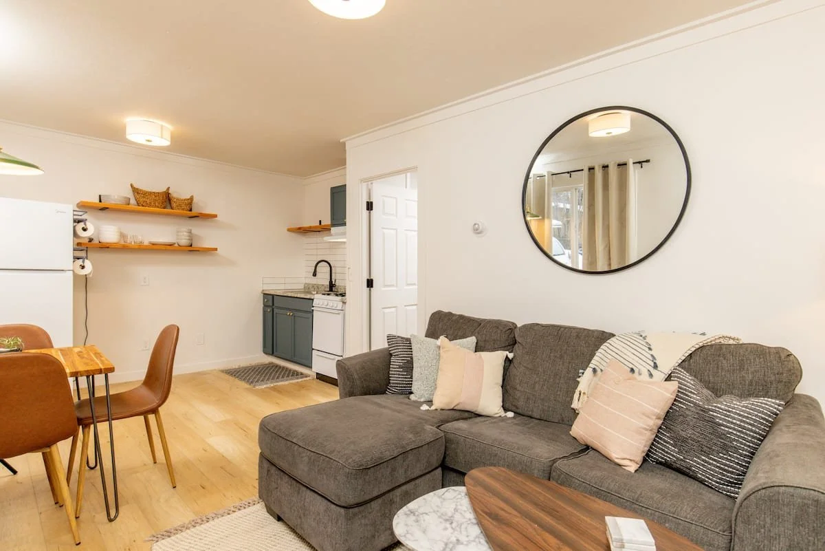 Renovated and furnished living room at Iowa Flats, a ten-unit multifamily property in Anchorage, Alaska.