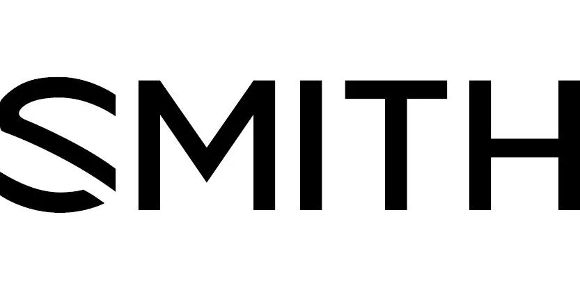 Dela av en textbild med ordet 'SMITH' i svart på vitt bakgrund.