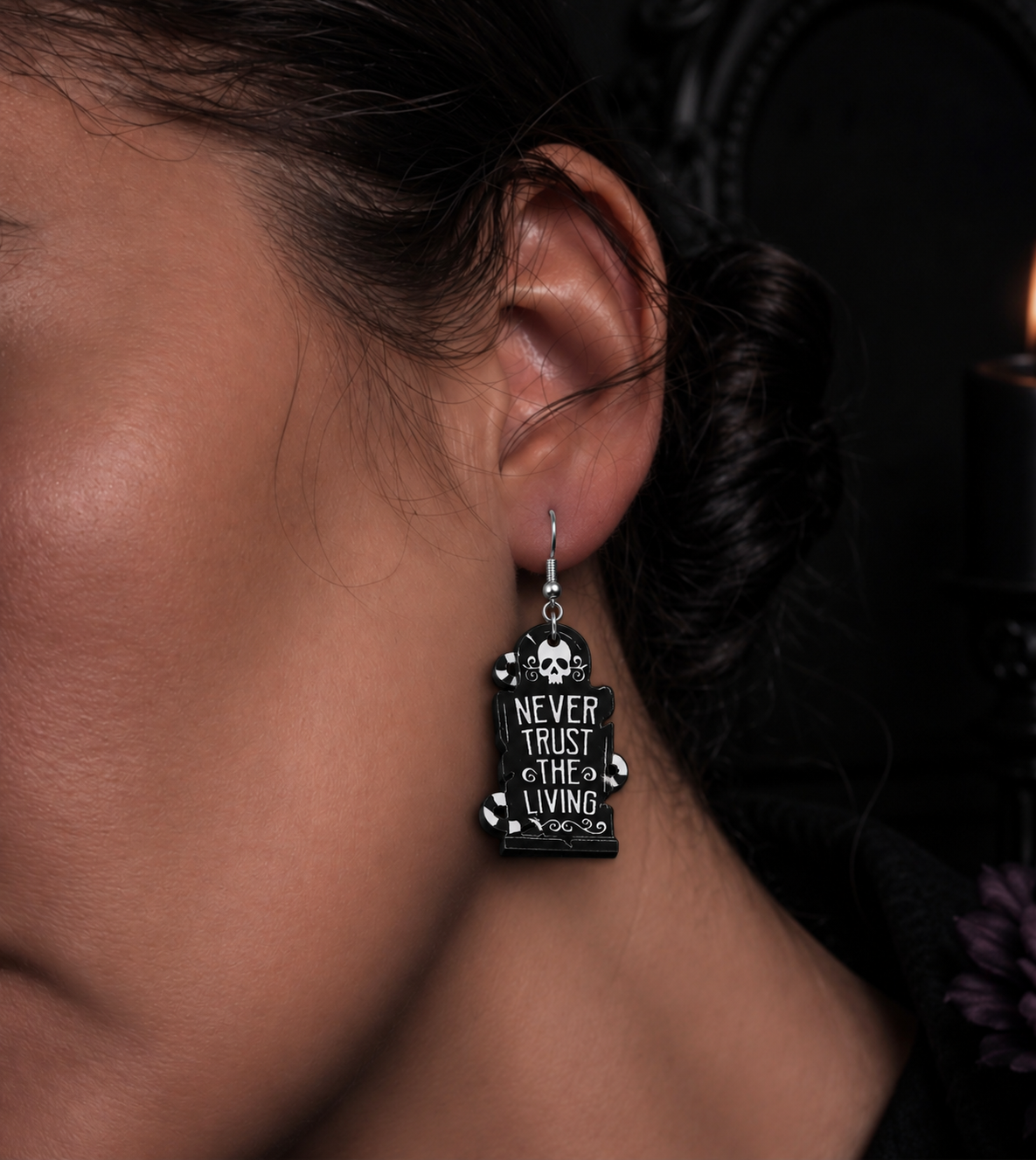 Never trust the living drop earrings