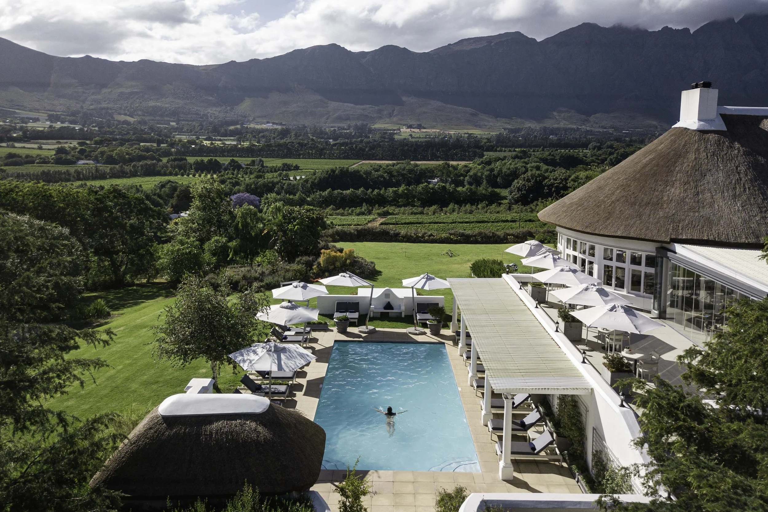 01-Mont-Rochelle-Exterior-with-Guest-in-Pool-1.jpg