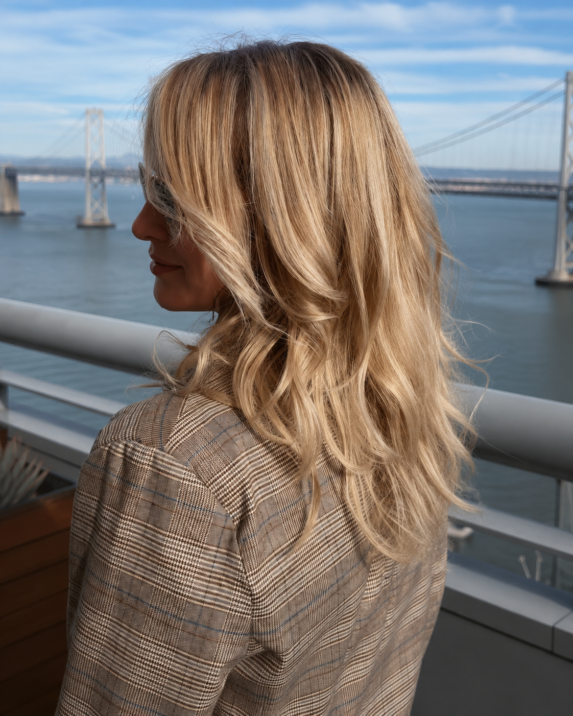 Soft beige blonde transformation with healthy-looking shine by Olena in the Bay Area.