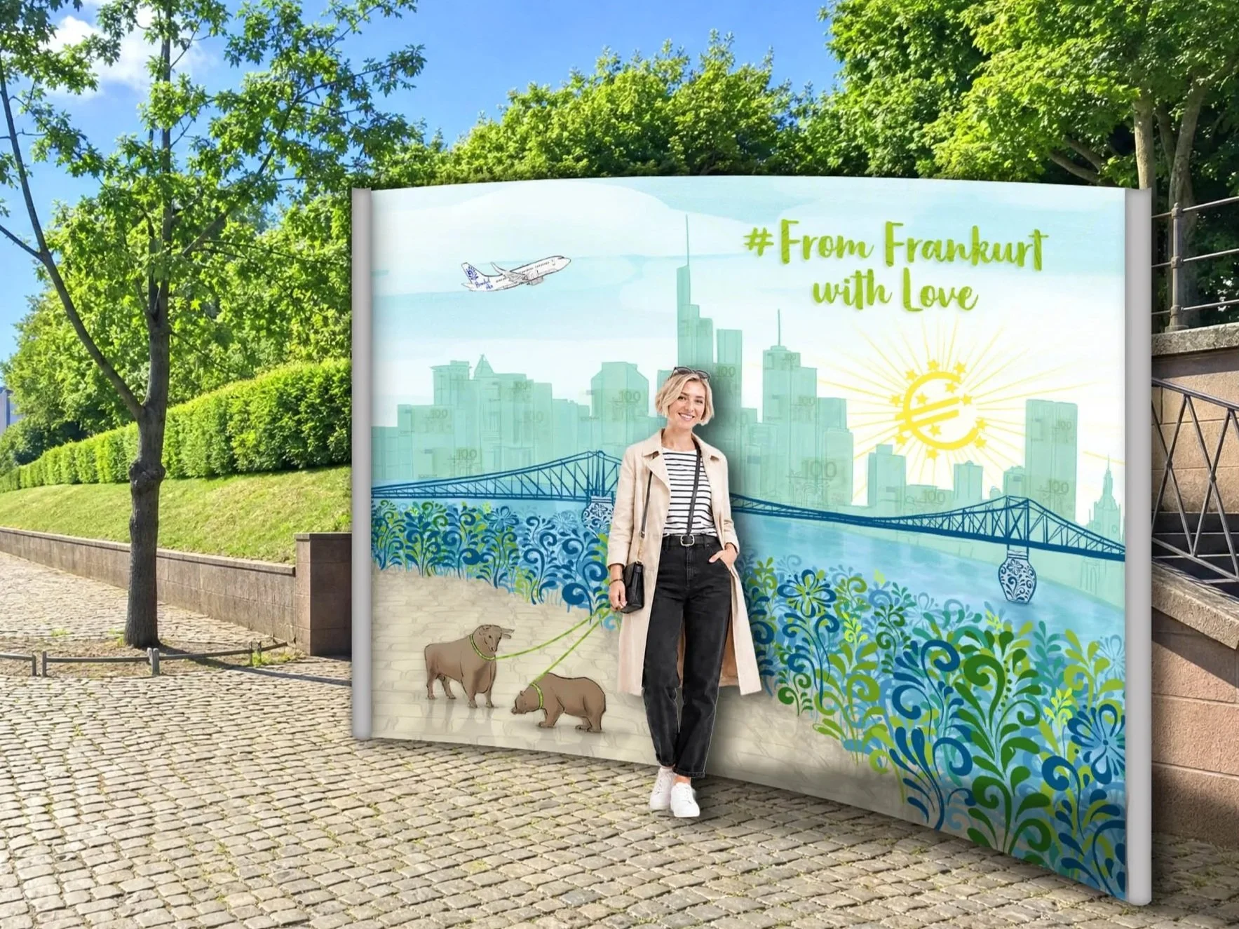Konzept für die "Queen of Frankfurt" von Anna- Plakat mit Grußbotschaft: »#From Frankfurt with Love«. Es zeigt eine Frau mit einem Hund in der Hand, vor einer Illustration der Frankfurter Skyline.