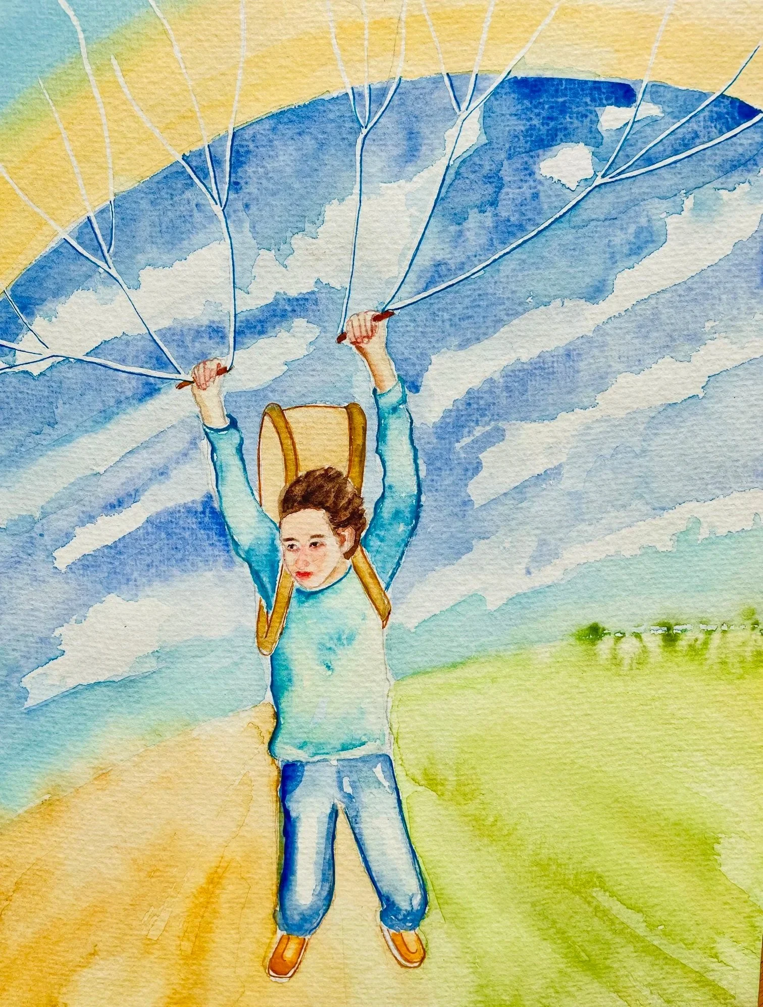 Watercolor painting of a boy paragliding with a blue-and-yellow glider. The sky is blue with white clouds, and the ground is green and yellow.