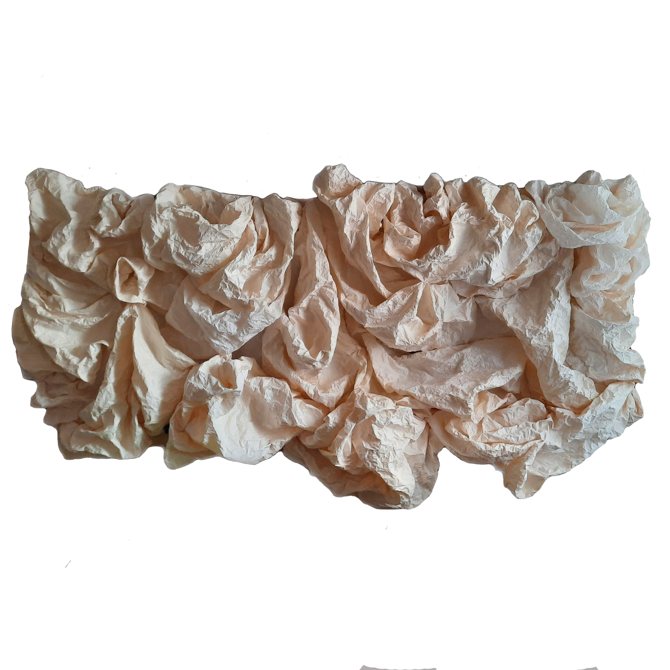 Close-up of crumpled, light brown paper.