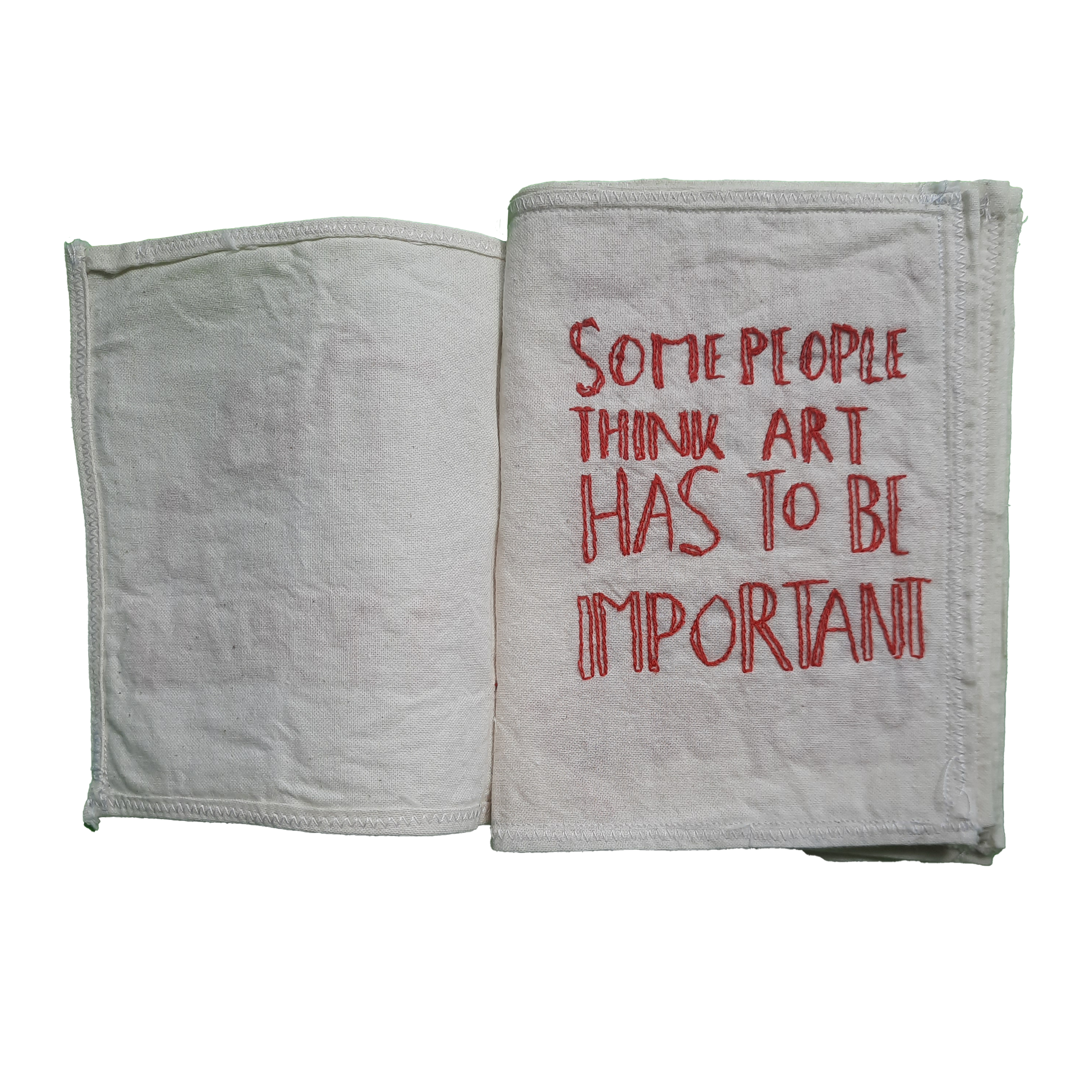 Close-up of two white cloth face masks with one mask featuring red embroidered text reading 'SOPHIEPEOPLE THINK ABOUT MUSIC'.