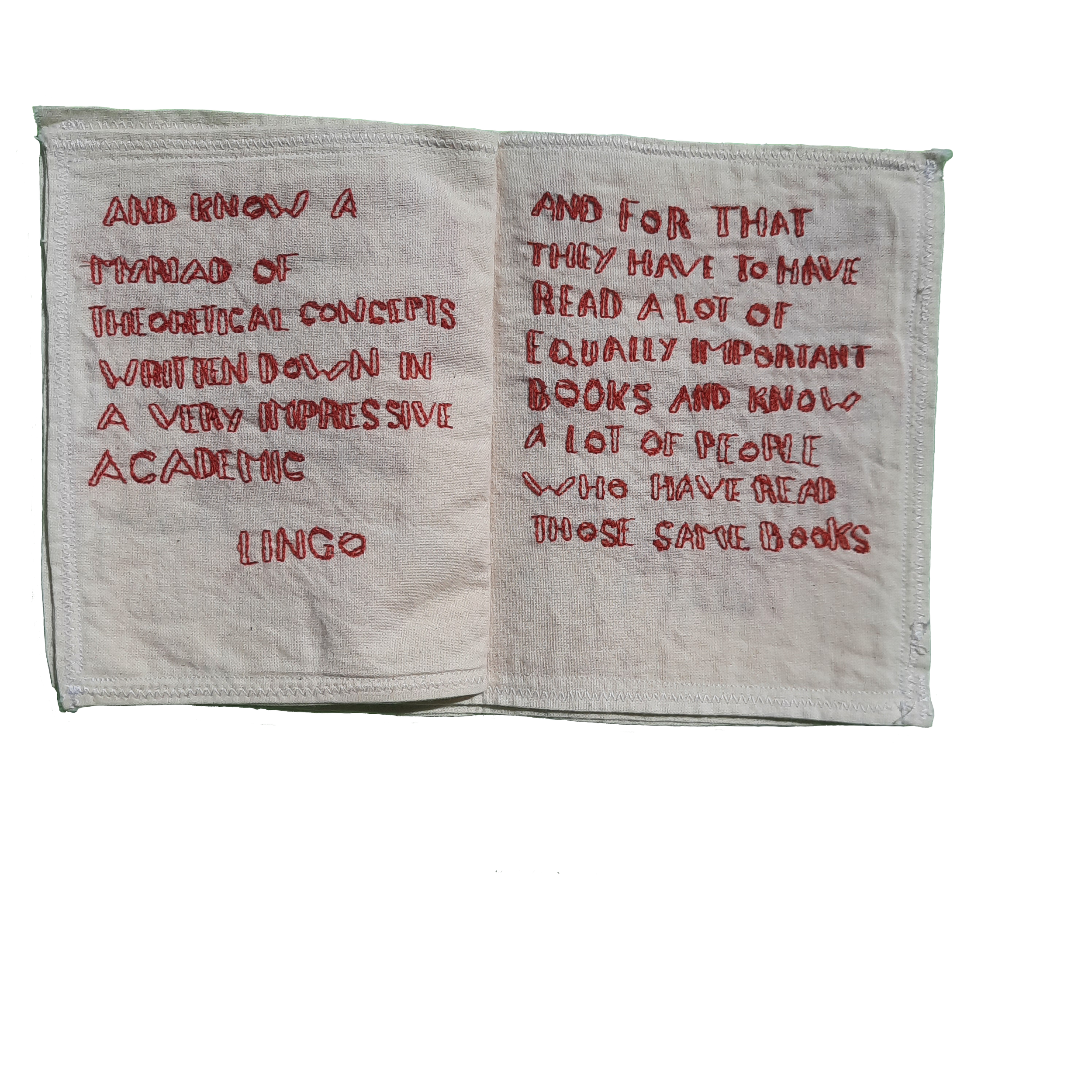 Close-up of embroidered text on a white fabric, with some letters partially visible, discussing academic concepts and the importance of reading and knowledge.
