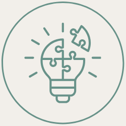 Lightbulb with puzzle pieces representing ideas and problem solving
