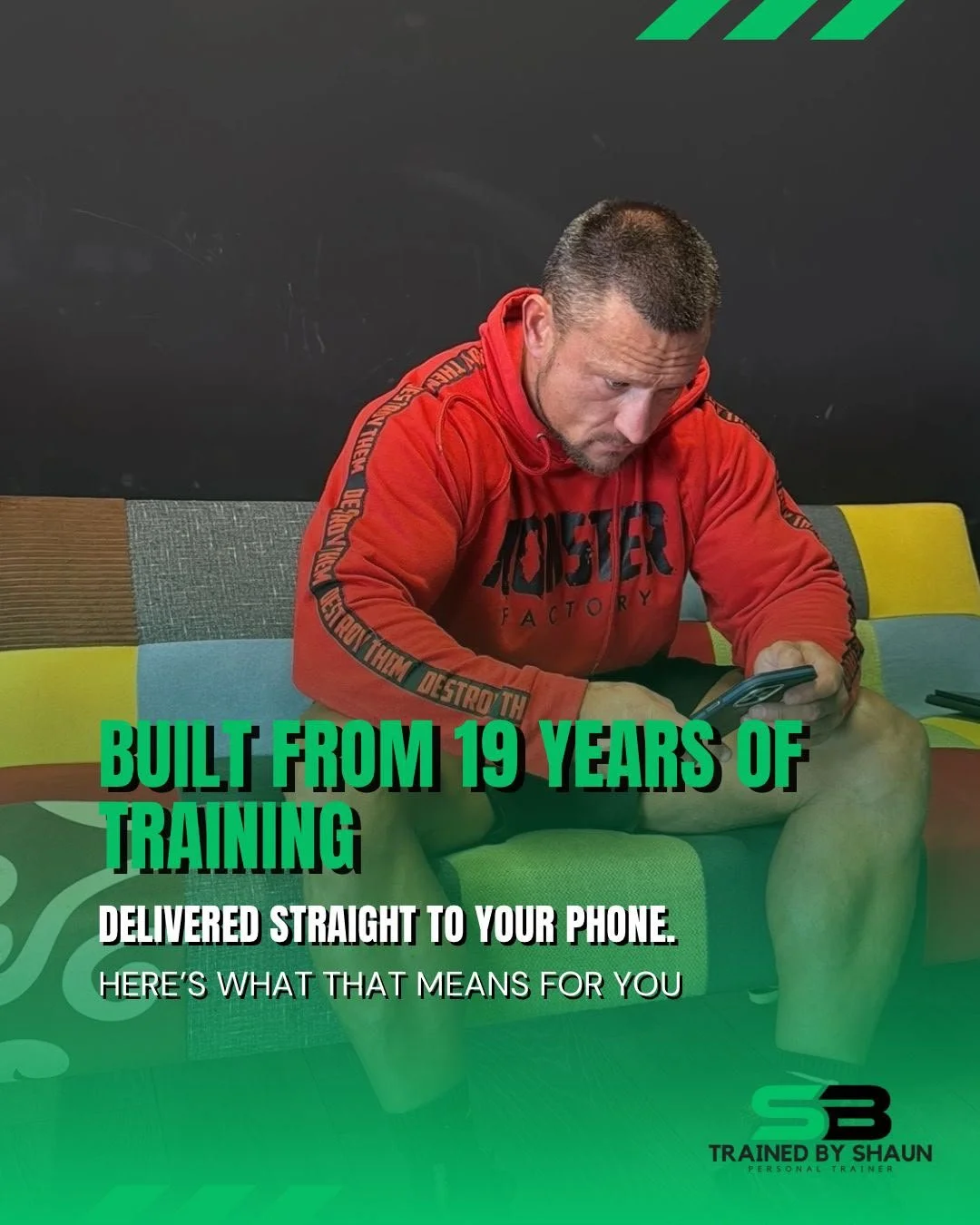 A man wearing a red hoodie sits on a colorful bench, looking at his phone. Overlay text reads, 'Built from 19 years of training delivered straight to your phone. Here's what that means for you.' The logo at the bottom right says 'Trained by Shaun, Personal Trainer.'