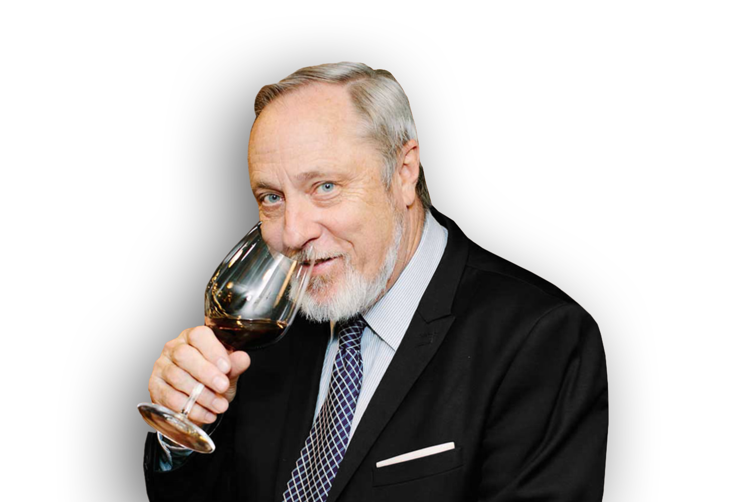 A man with gray hair and a beard wearing a black suit and tie, holding a glass of red wine close to his face.