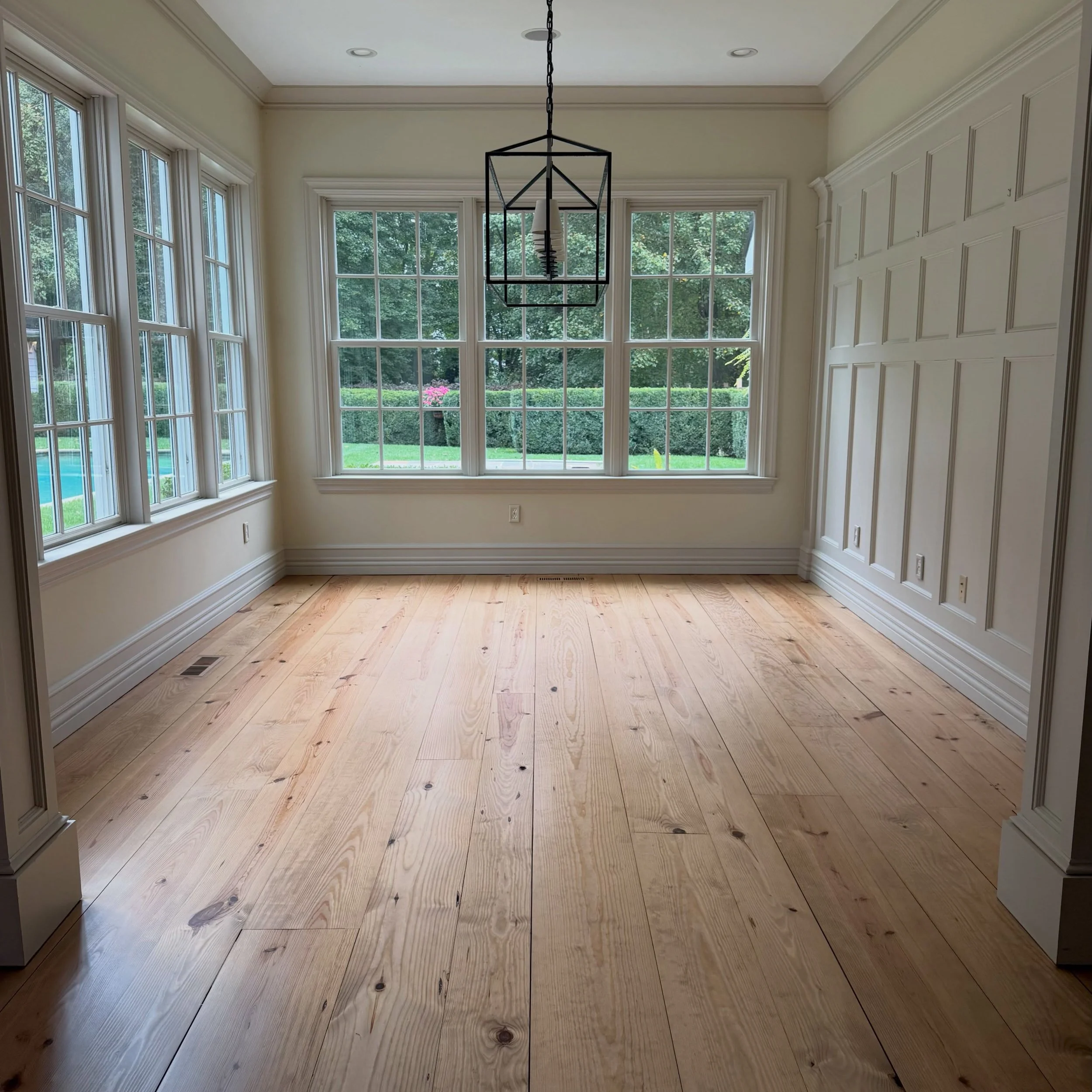 We couldn&rsquo;t be happier with the results of this project!

Our goal was to neutralize the natural orange and red undertones found in Heart Pine flooring while preserving the character and beauty of the wood.

The result: a beautifully balanced, 
