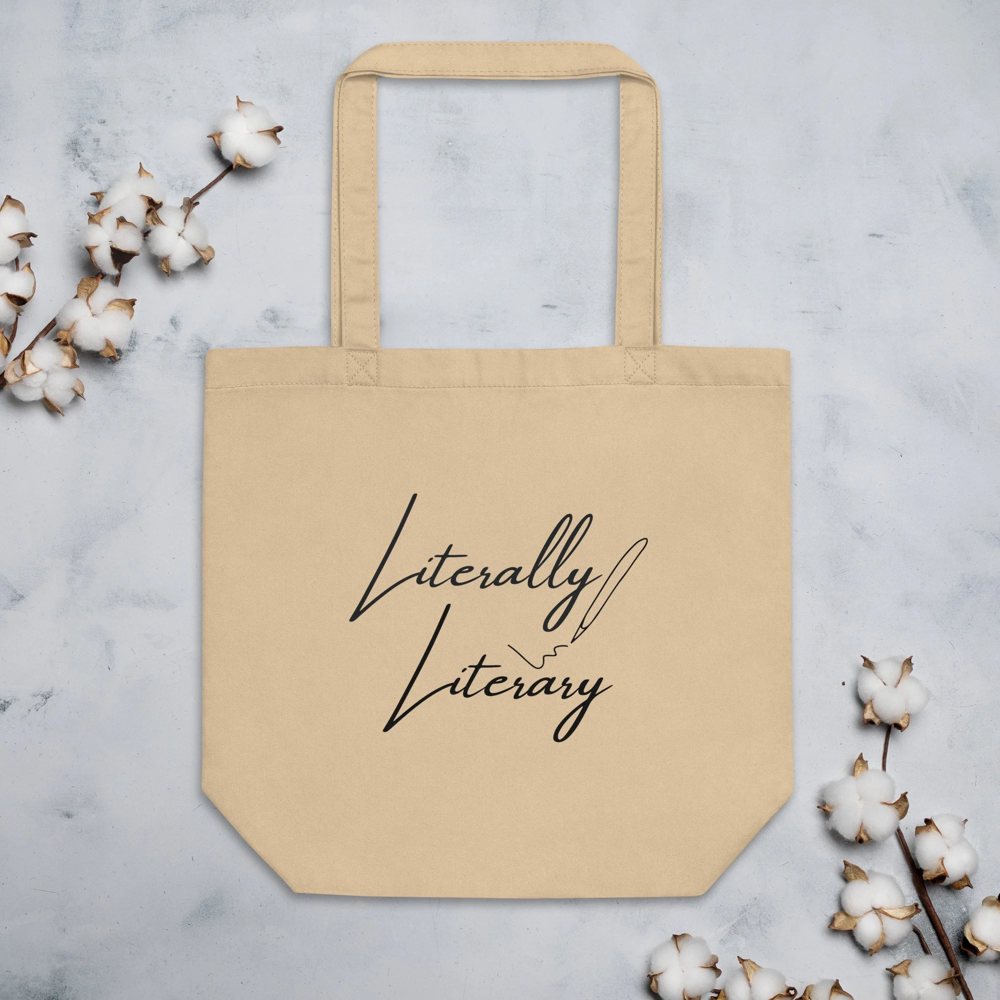 Literally Literary eco tote bag in oyster, styled with cotton stems