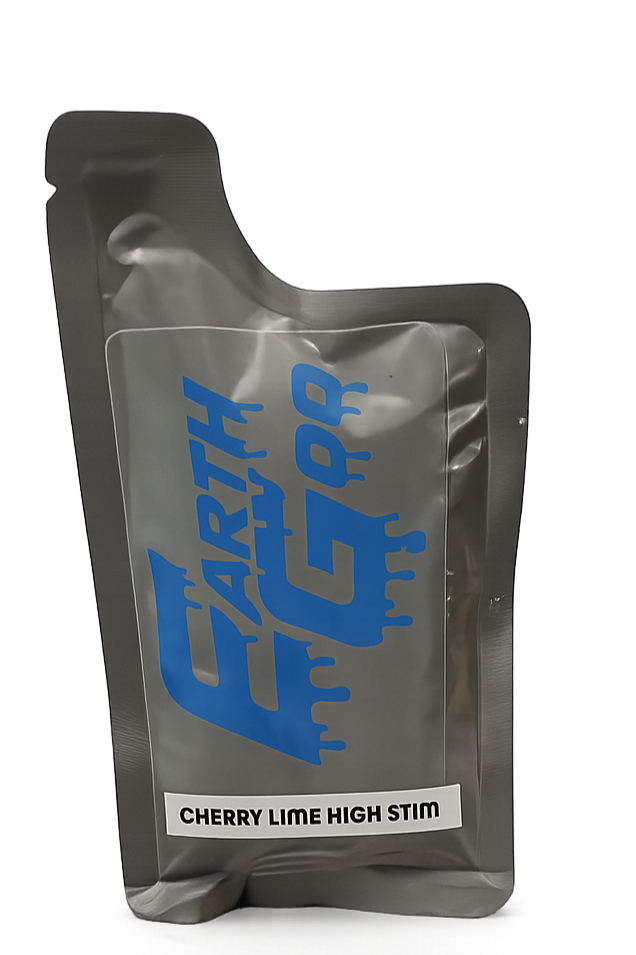 A silver, flexible pouch labeled "Cherry Lime High Stim" with Earth Goo on the front that contains preworkout gel.