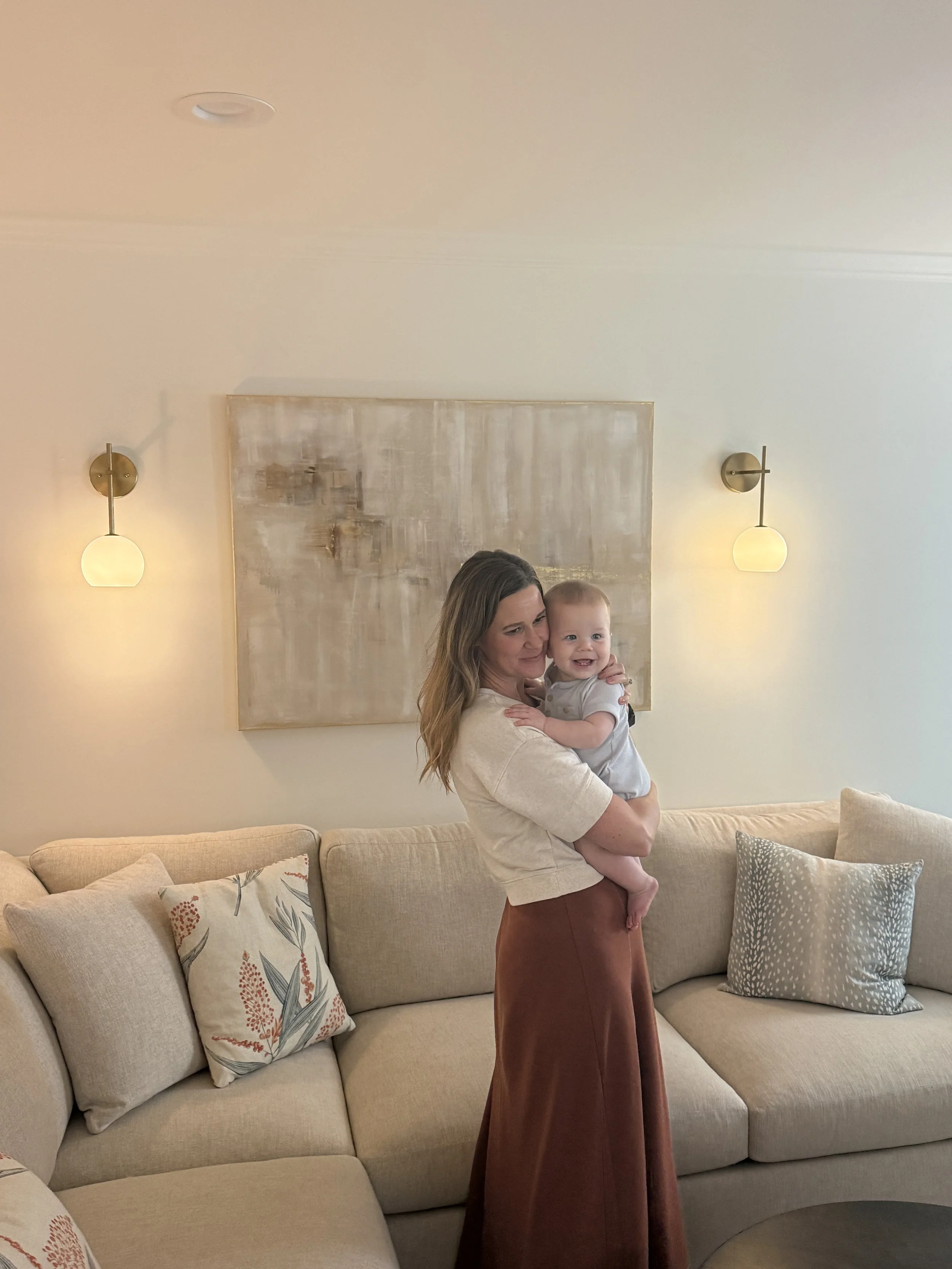 An original Court Haze painting in the living room of collectors Laura and Ben Long in Charlotte, NC