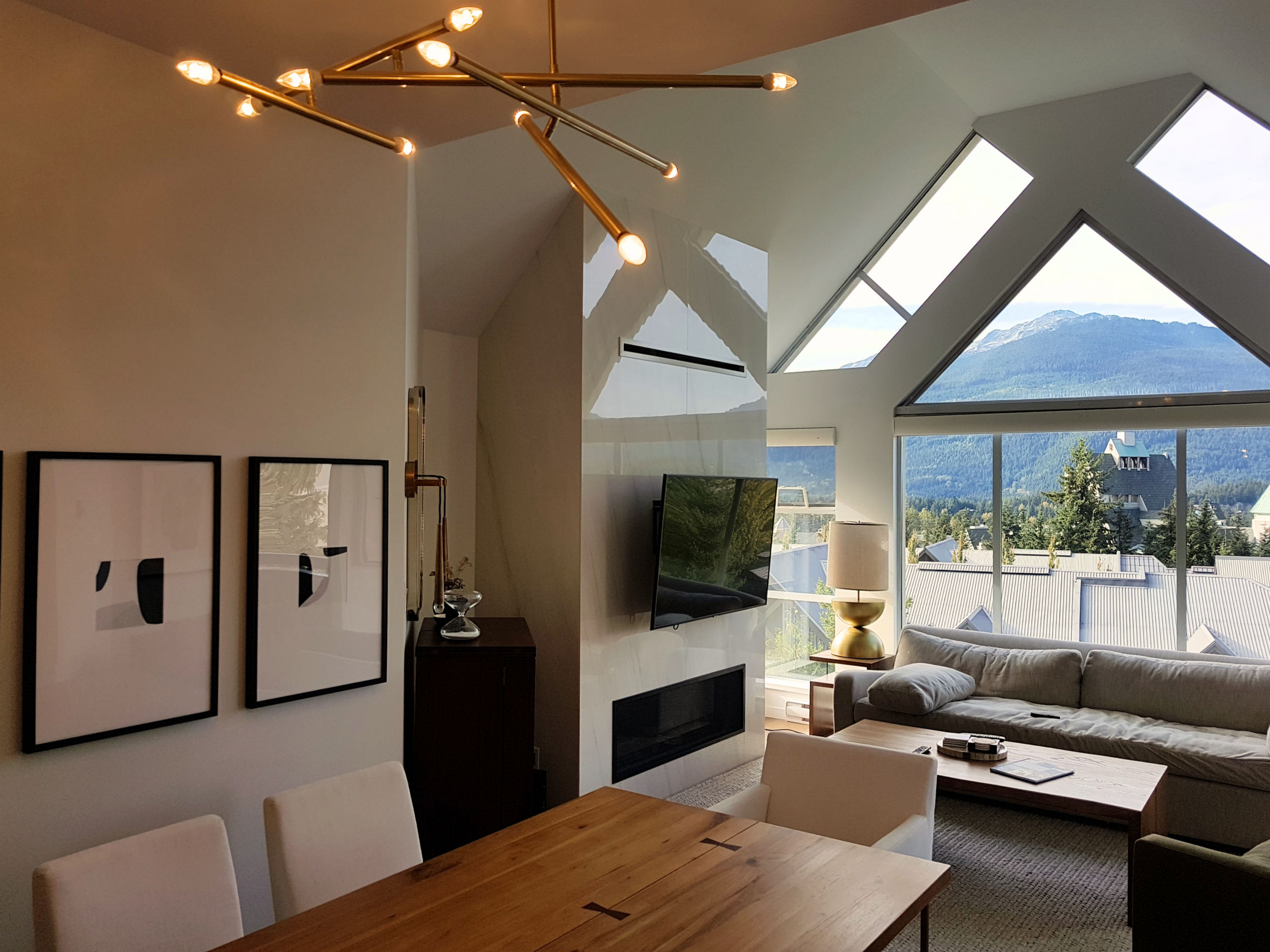 Custom lighting design and pendant fixture installation in a Whistler living room