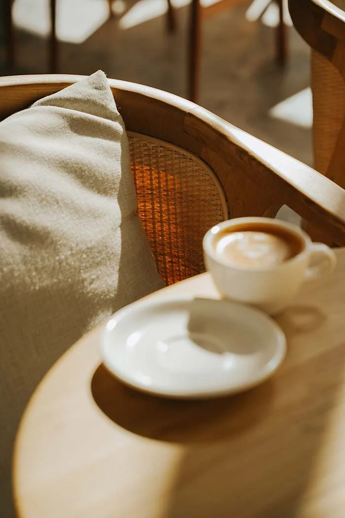 Elegant, clean breakfast table with coffee