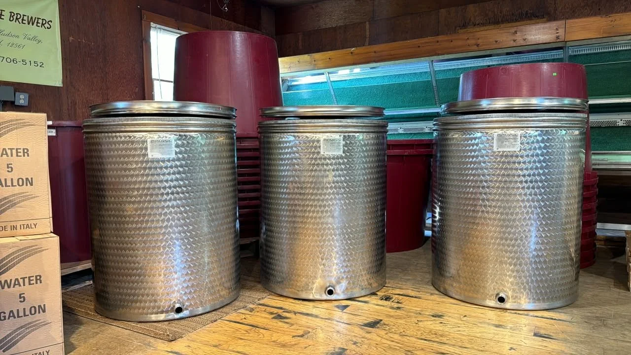 Stainless tanks and red fermentation tubs at Pantano's