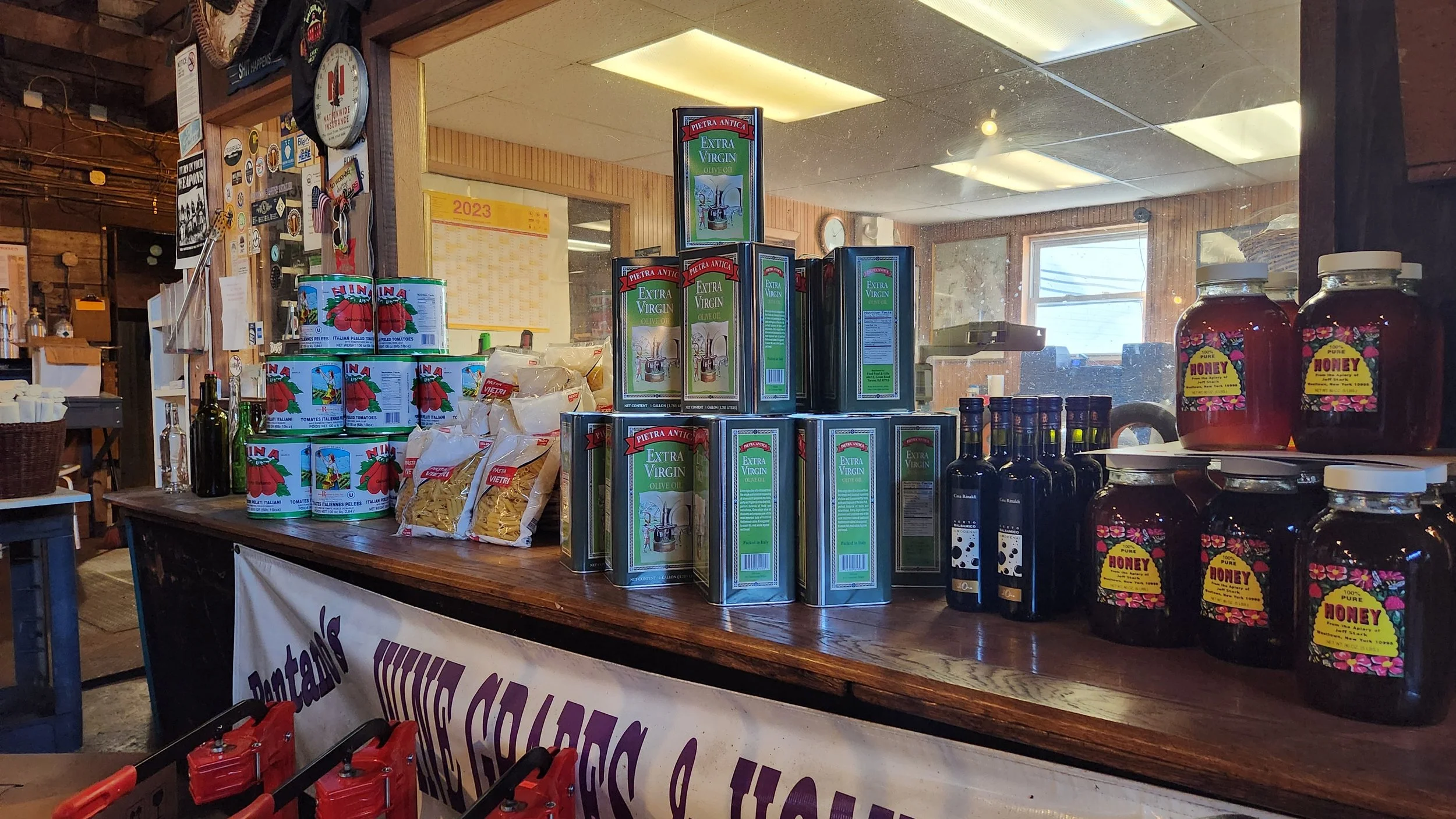 Imported Italian goods, honey, pasta, and olive oil displayed at Pantano's