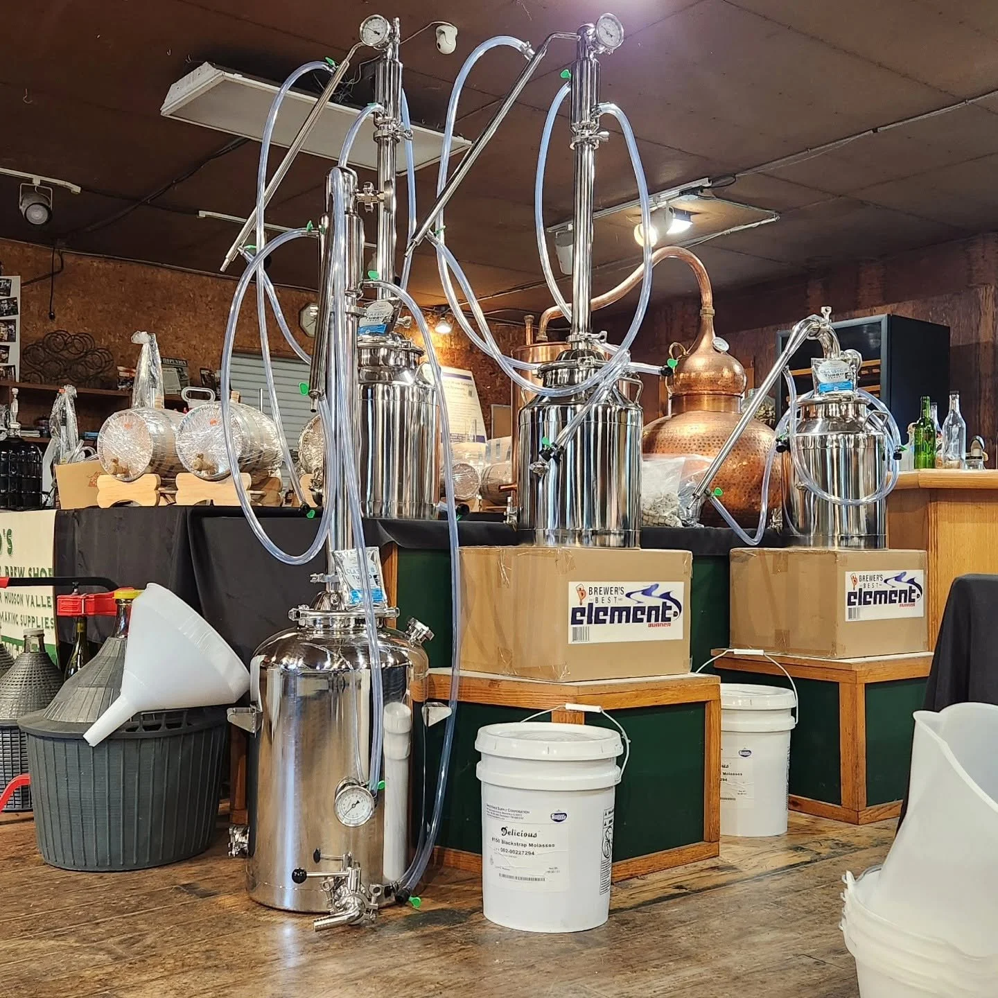 Copper stills and distilling equipment on display at Pantano's