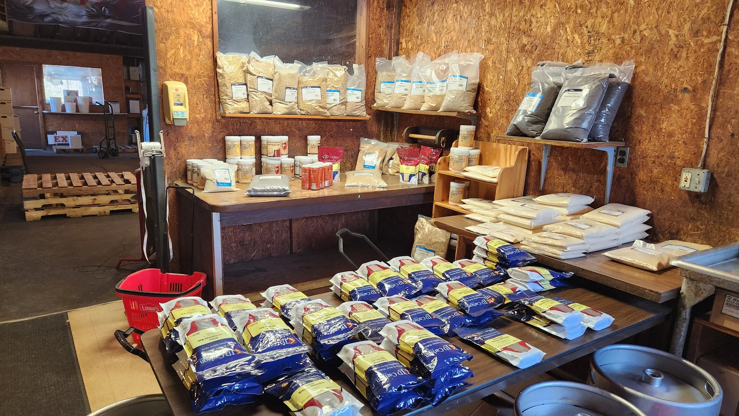 Dry goods, pasta, and shop supplies arranged on shelves at Pantano's