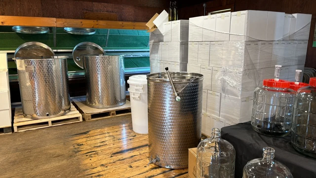 Stainless pots, tanks, boxes, and winemaking supplies at Pantano's