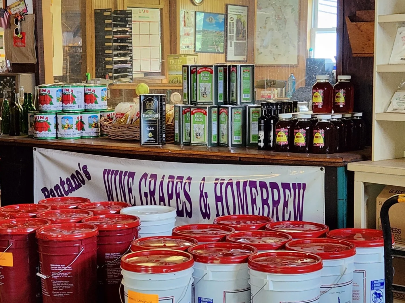 Wine juice pails, fermenting buckets, Italian goods, and winemaking supplies inside Pantano’s Wine Grapes in New Paltz