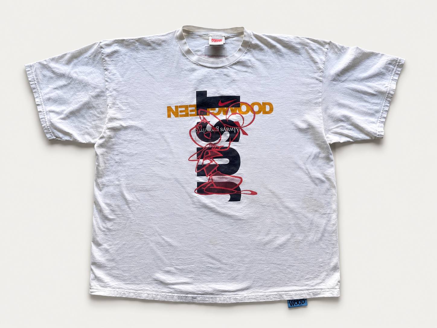 Graphic White T-Shirt Flat Lay.png