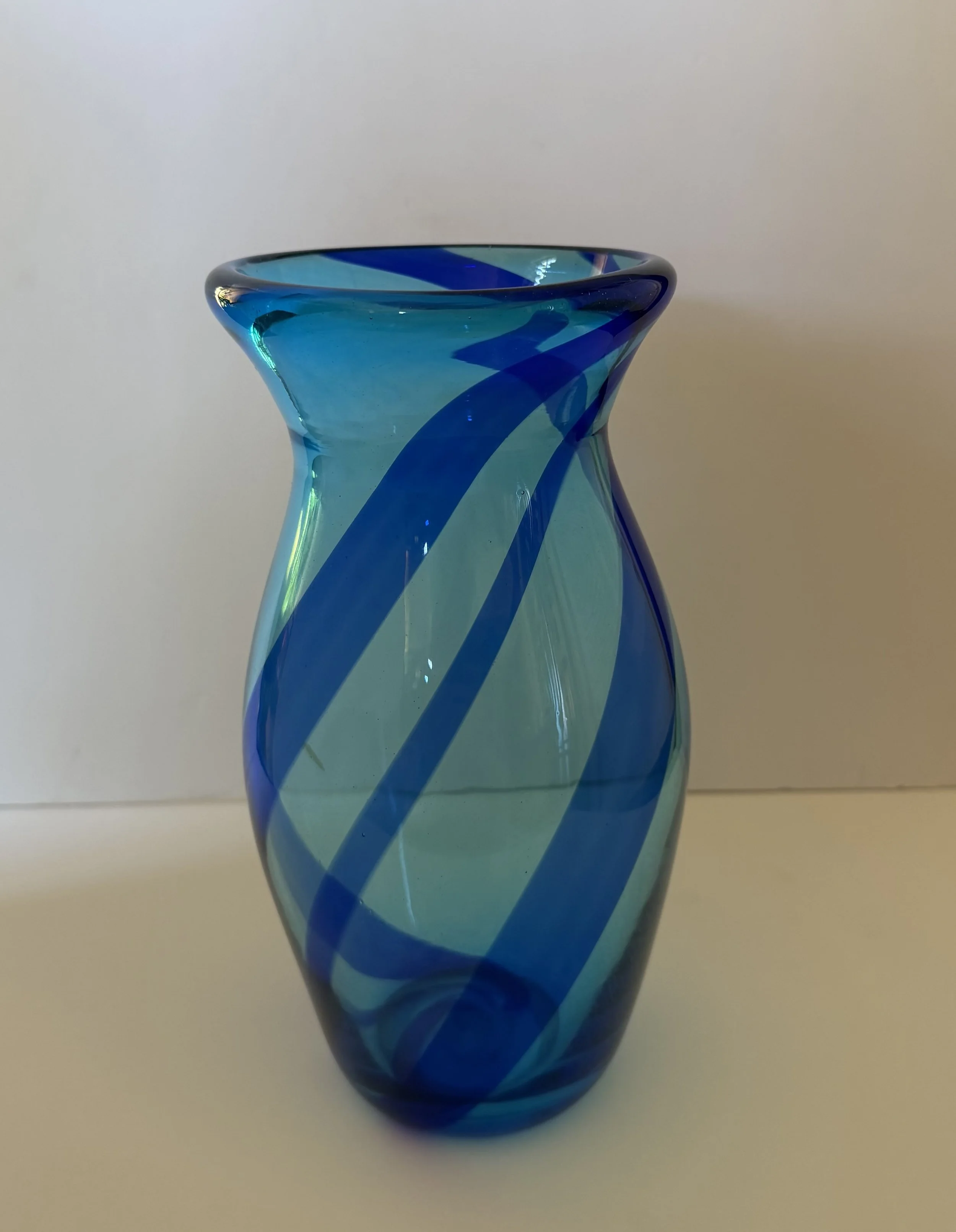 Handblown glass vase, Transparent aqua with dark blue swishes.