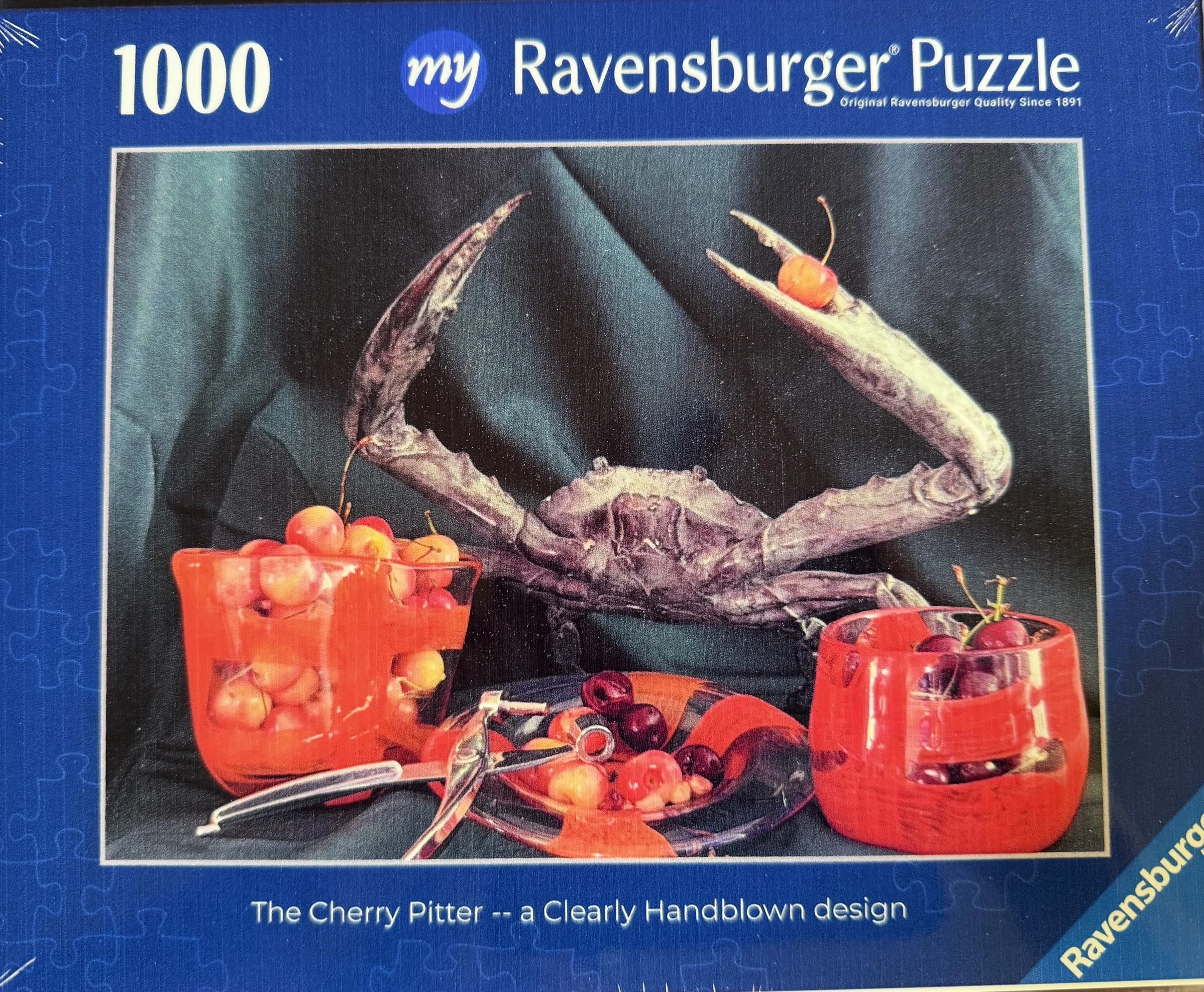 The Cherry Pitter — Ravensburger jigsaw puzzle box.