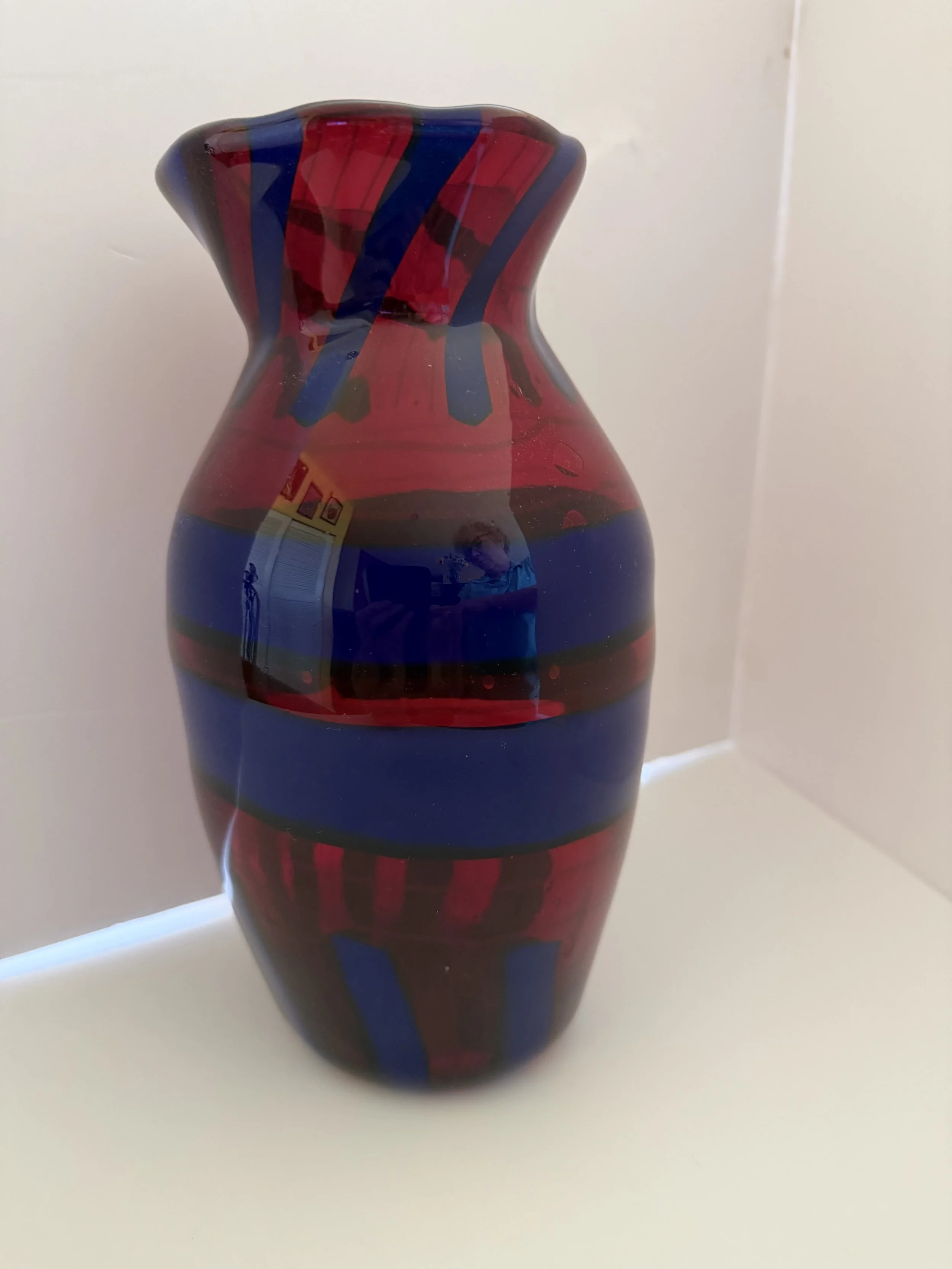 Transparent red with transparent blue rings and stripes
