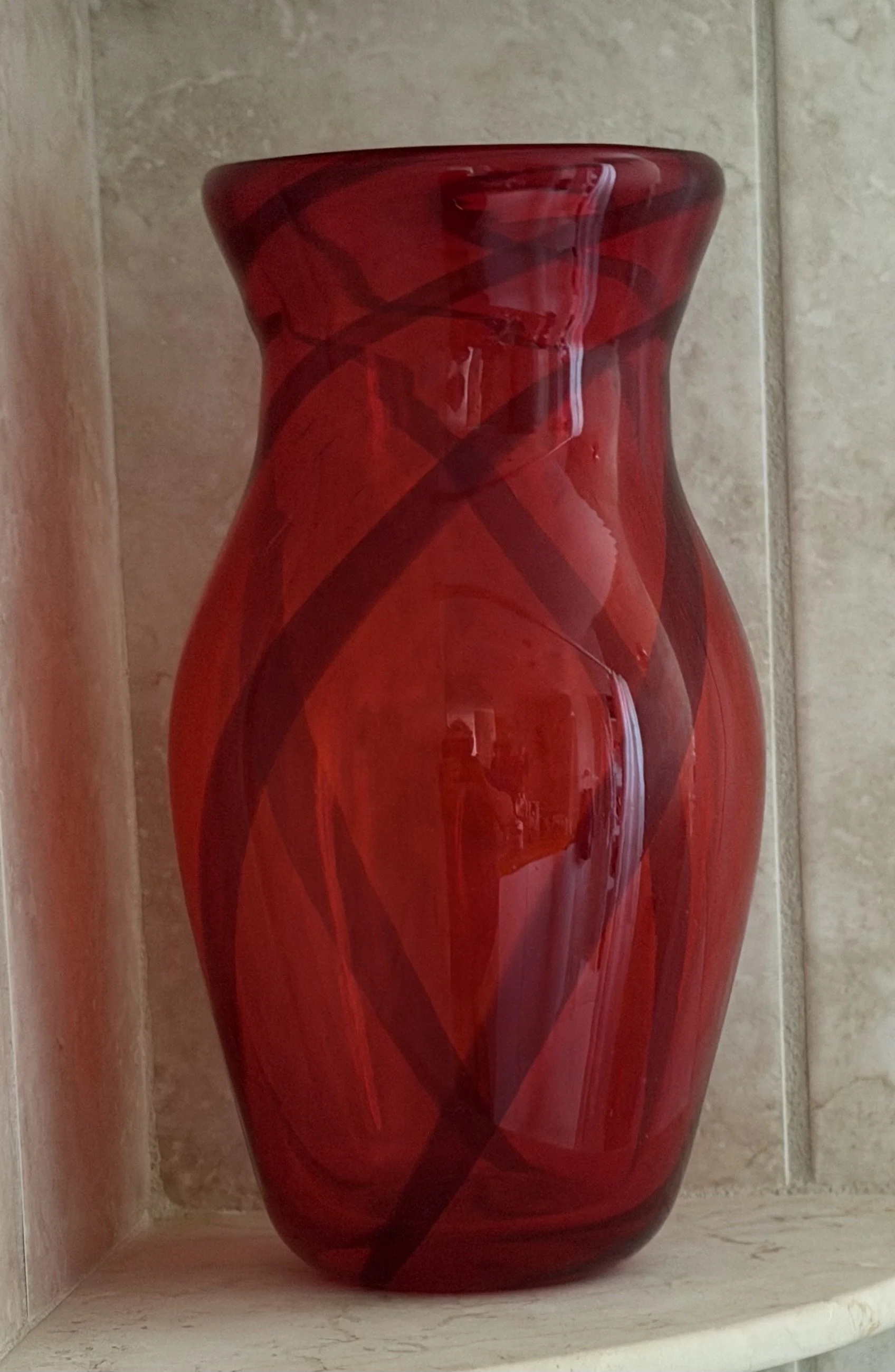Handblown glass vase: Red with blue stripes.