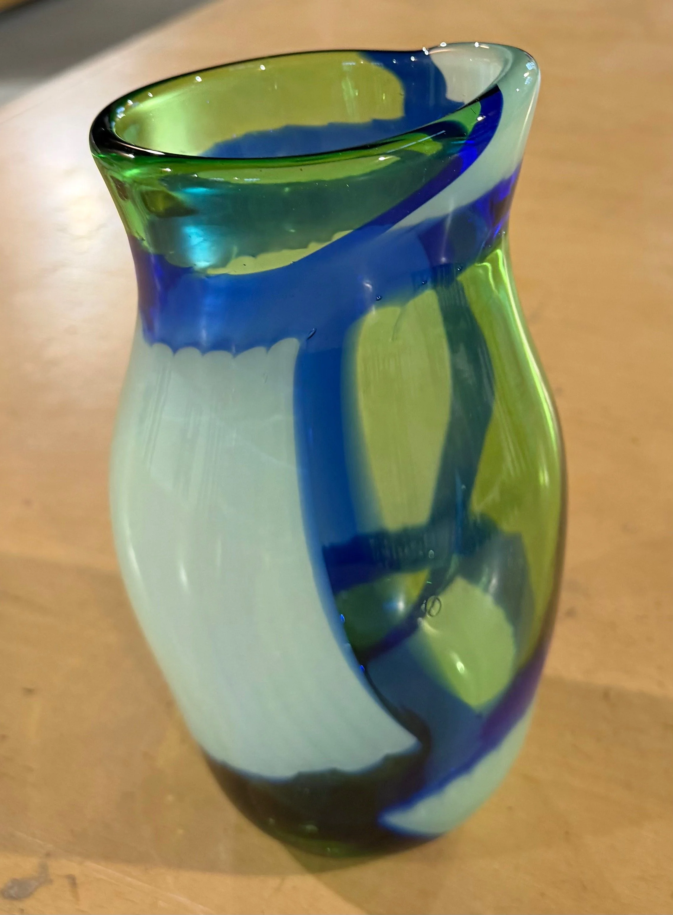 Handblown glass vase, Green and white with blue borders.