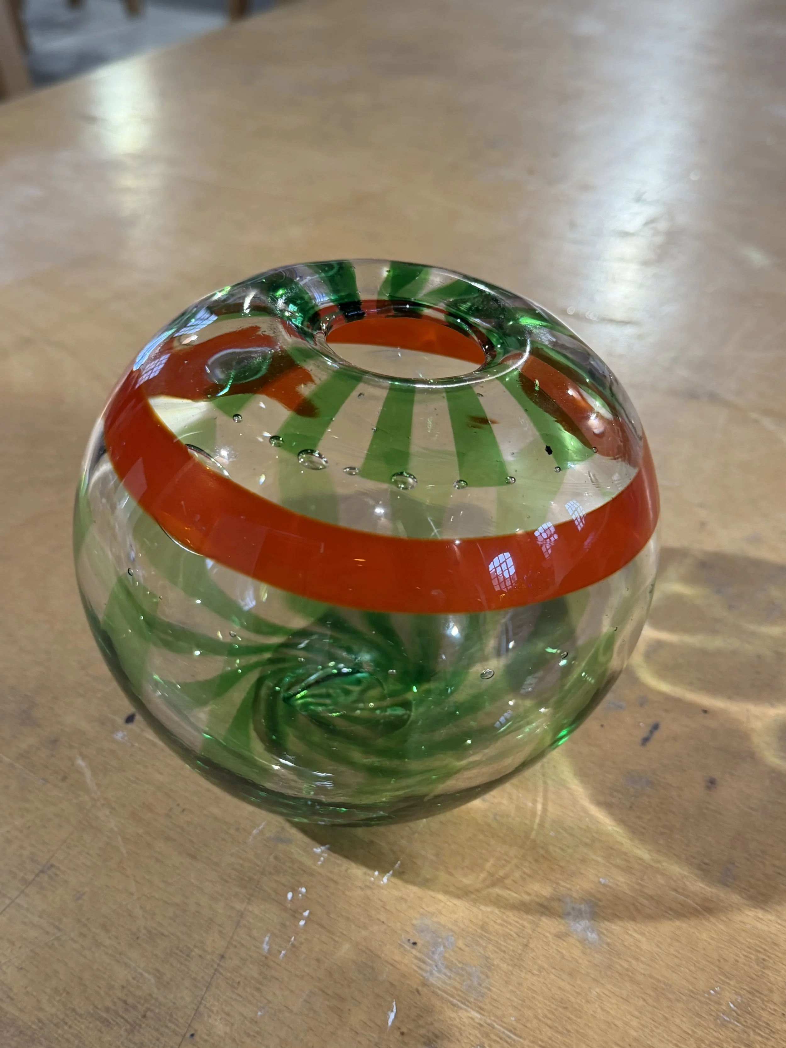 Handblown glass vase, Clear globe with green stripes and orange band.