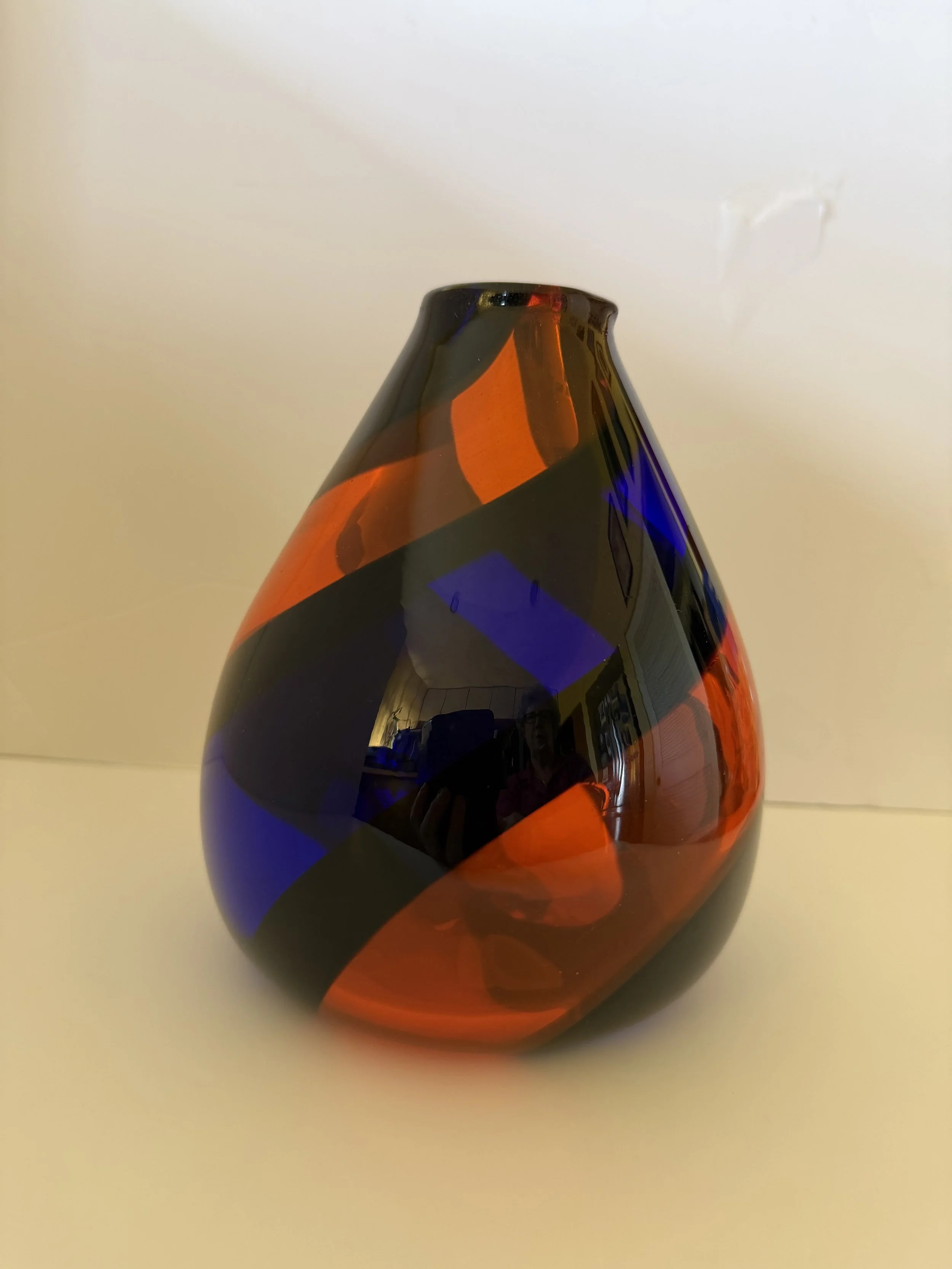 Transparent orange and dark blue teardrop