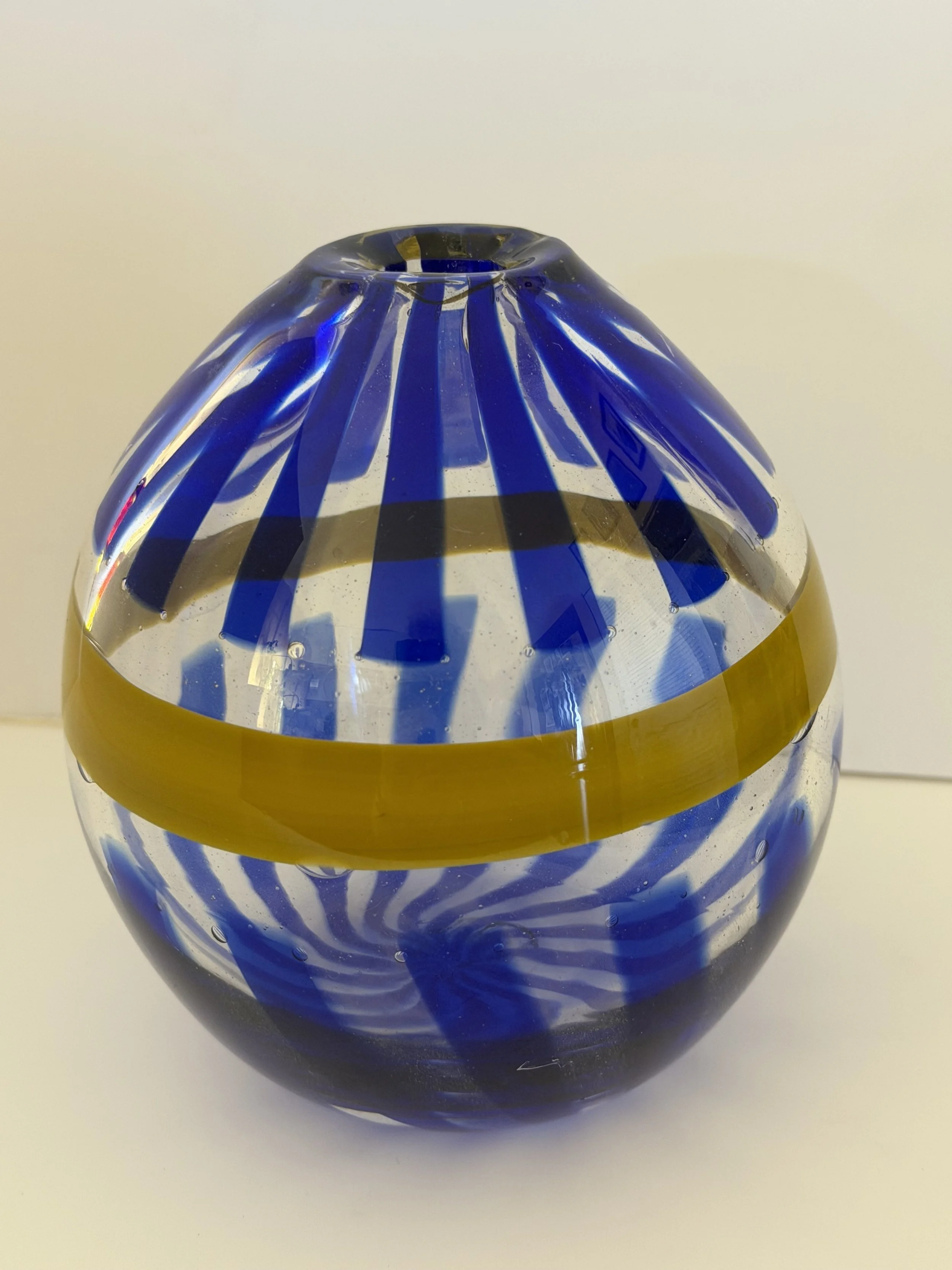 Handblown glass vase, Clear squat sphere with transparent blue stripes and maize belt.