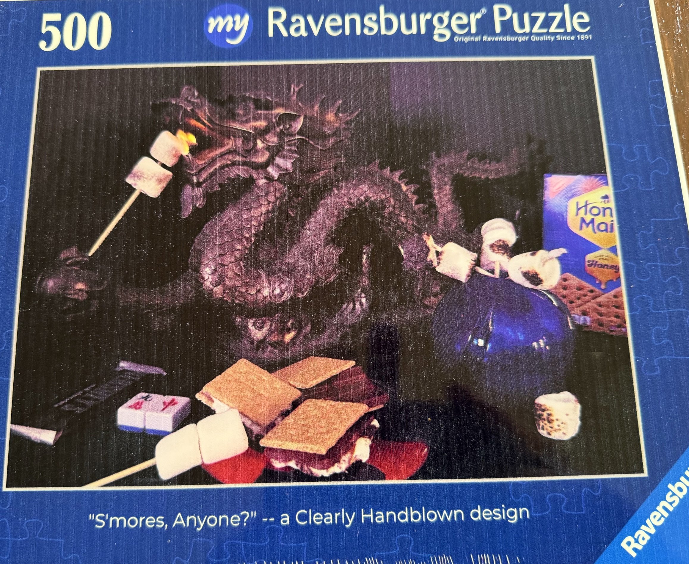 S’Mores, Anyone? campfire edition — Ravensburger jigsaw puzzle box.