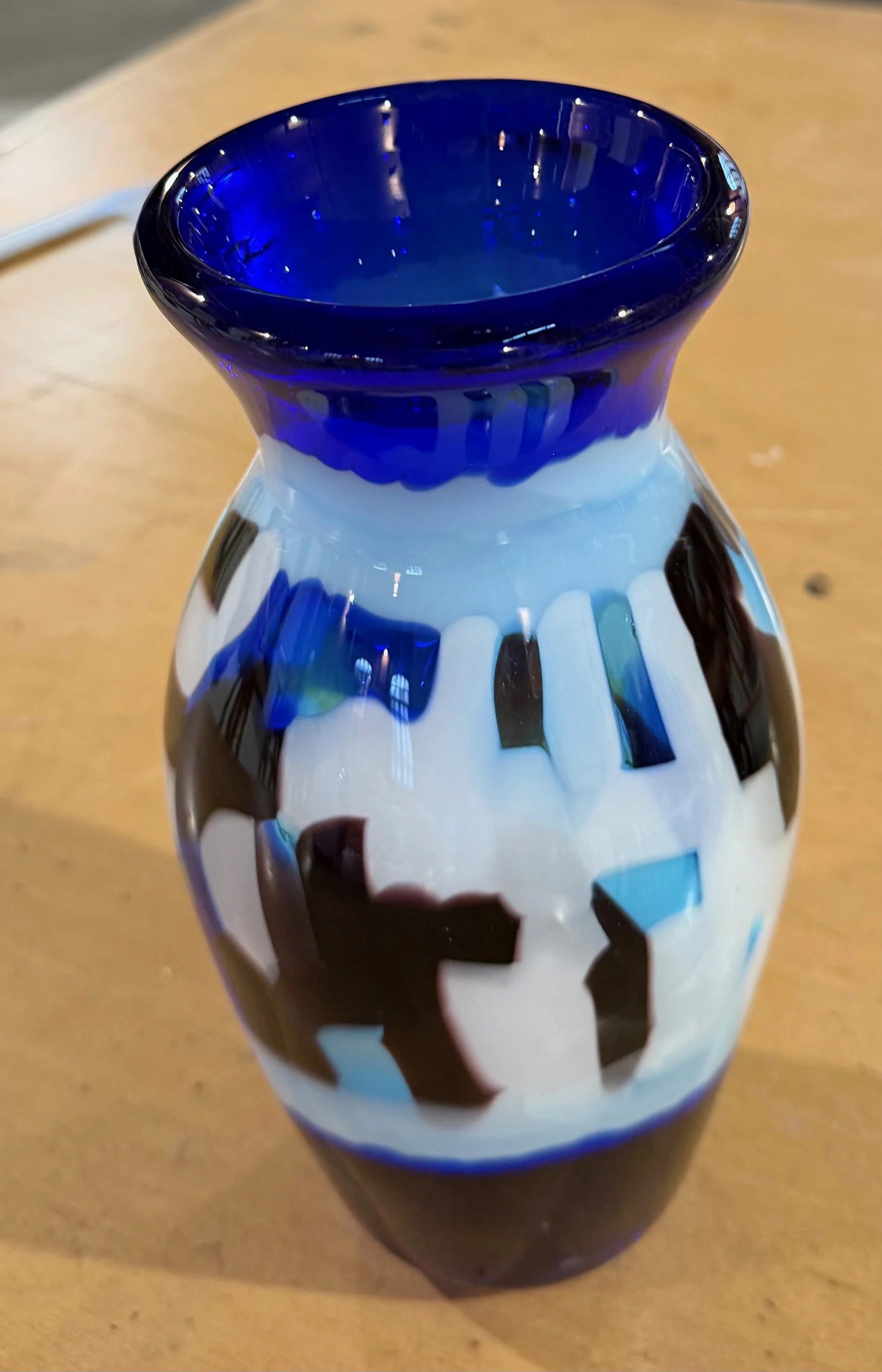 Handblown glass vase: Blue with large, multicolored midsection.